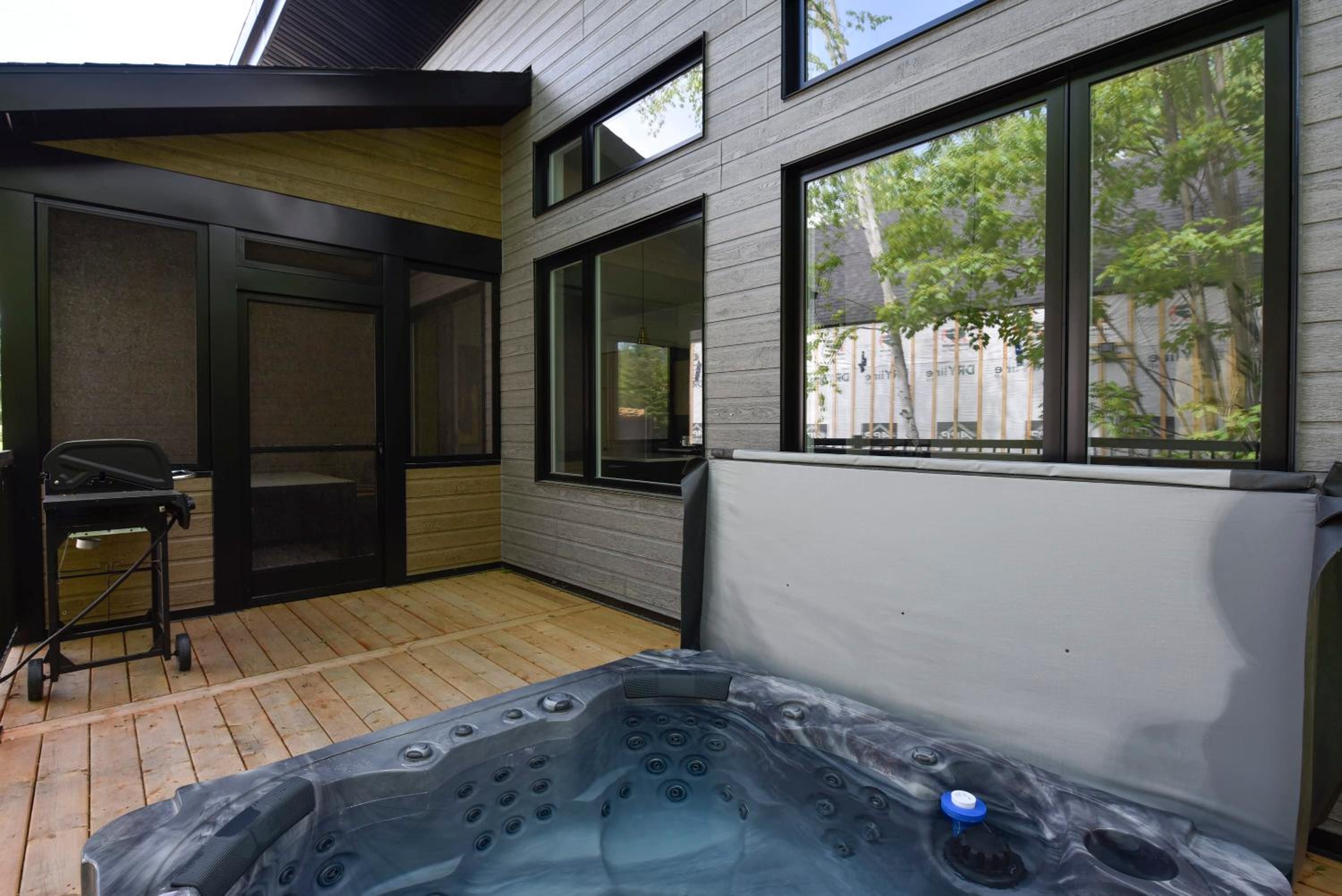 Achille - Boisé avec spa et sauna