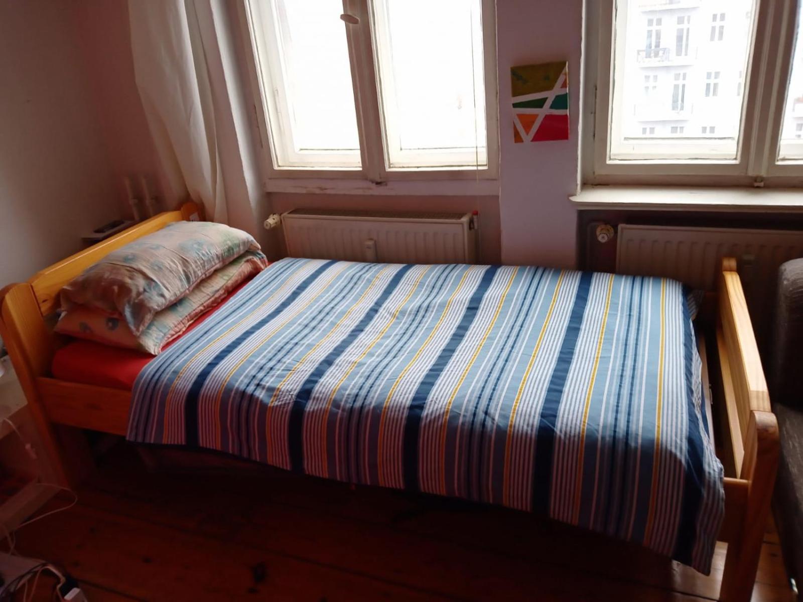 Double bed in sharing apartment
