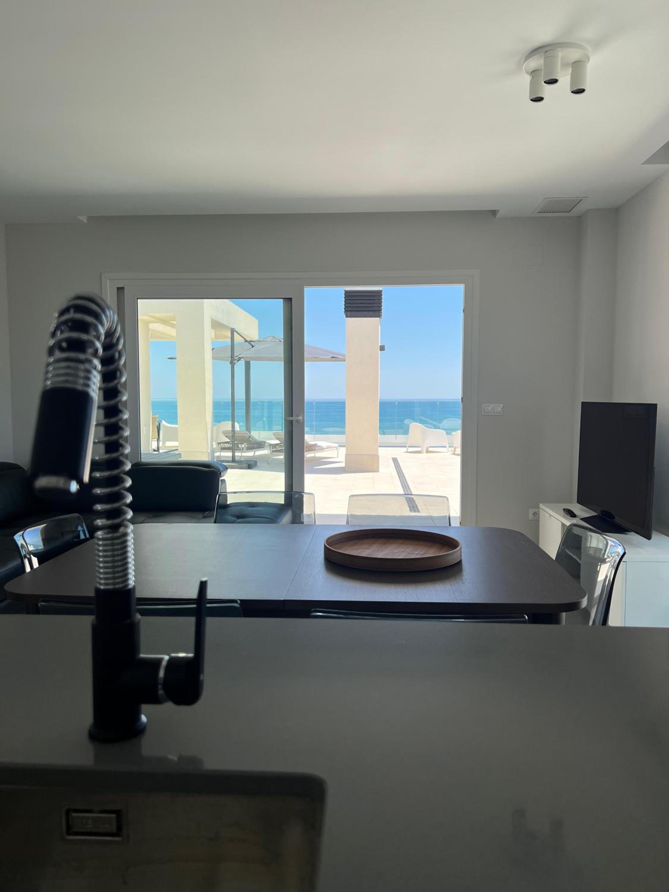 New penthouse with sunny beach view
