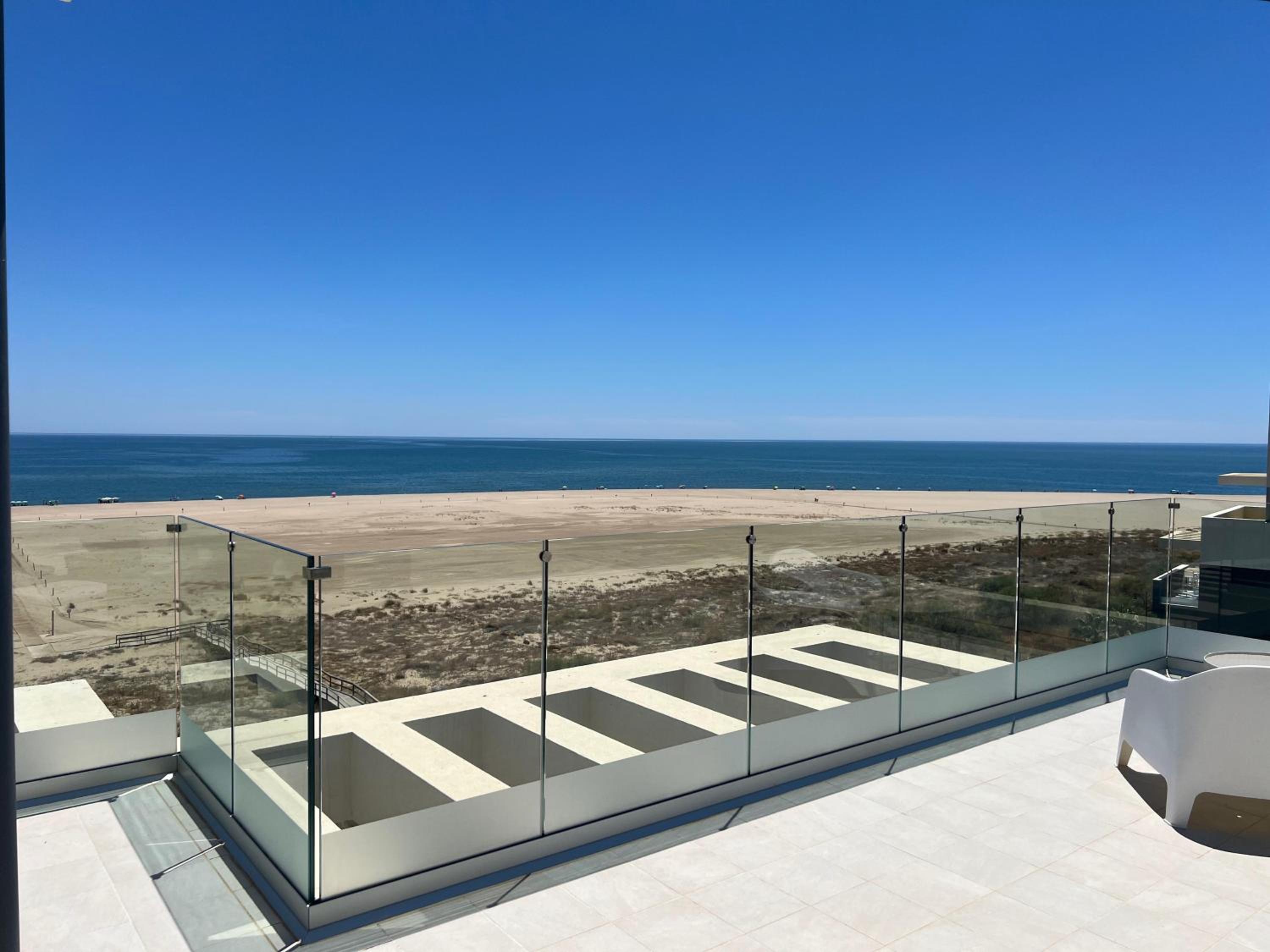 New penthouse with sunny beach view