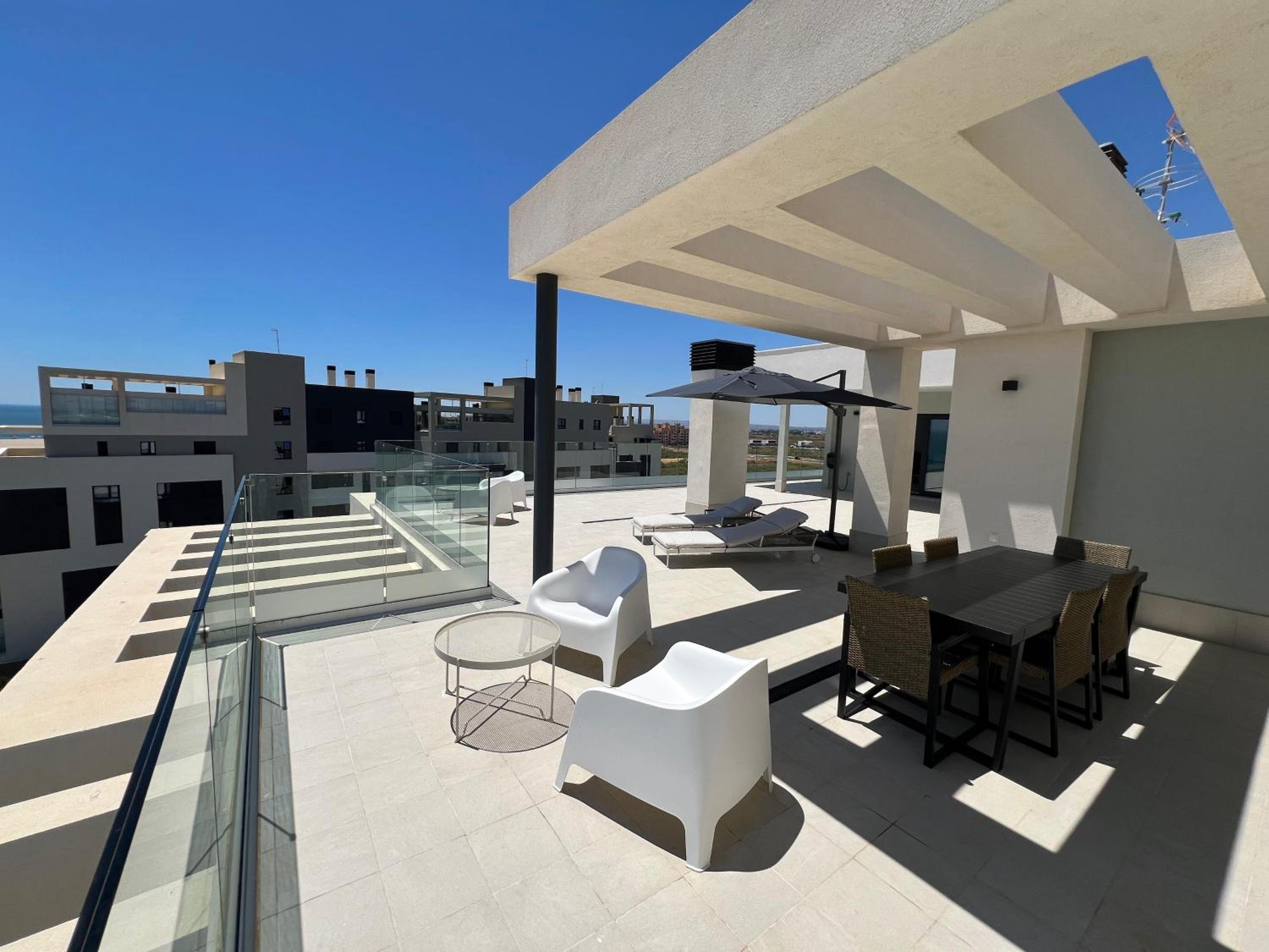 New penthouse with sunny beach view