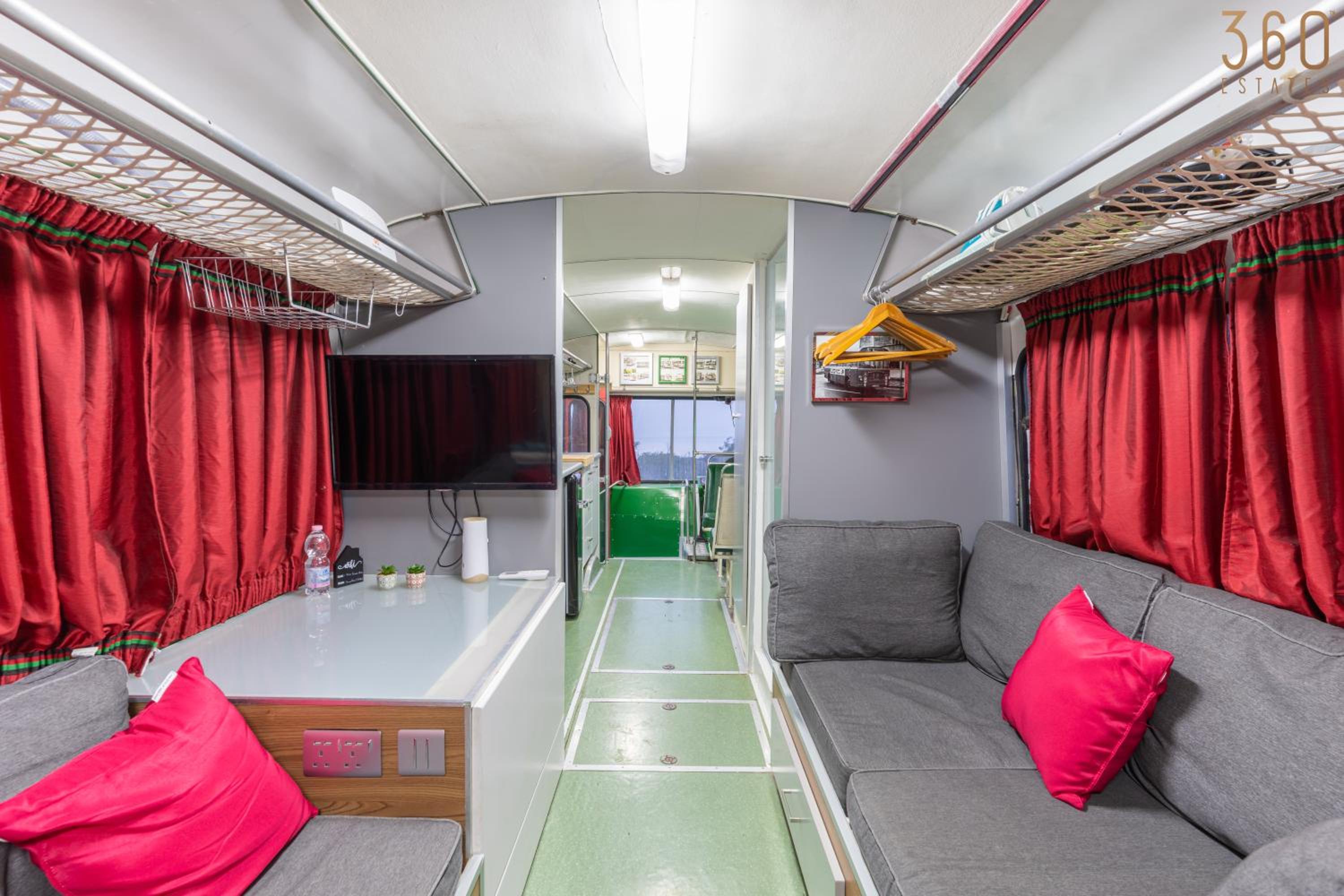 Unique Bus stay with stunning views in Ramla Bay by 360 Estates view 2