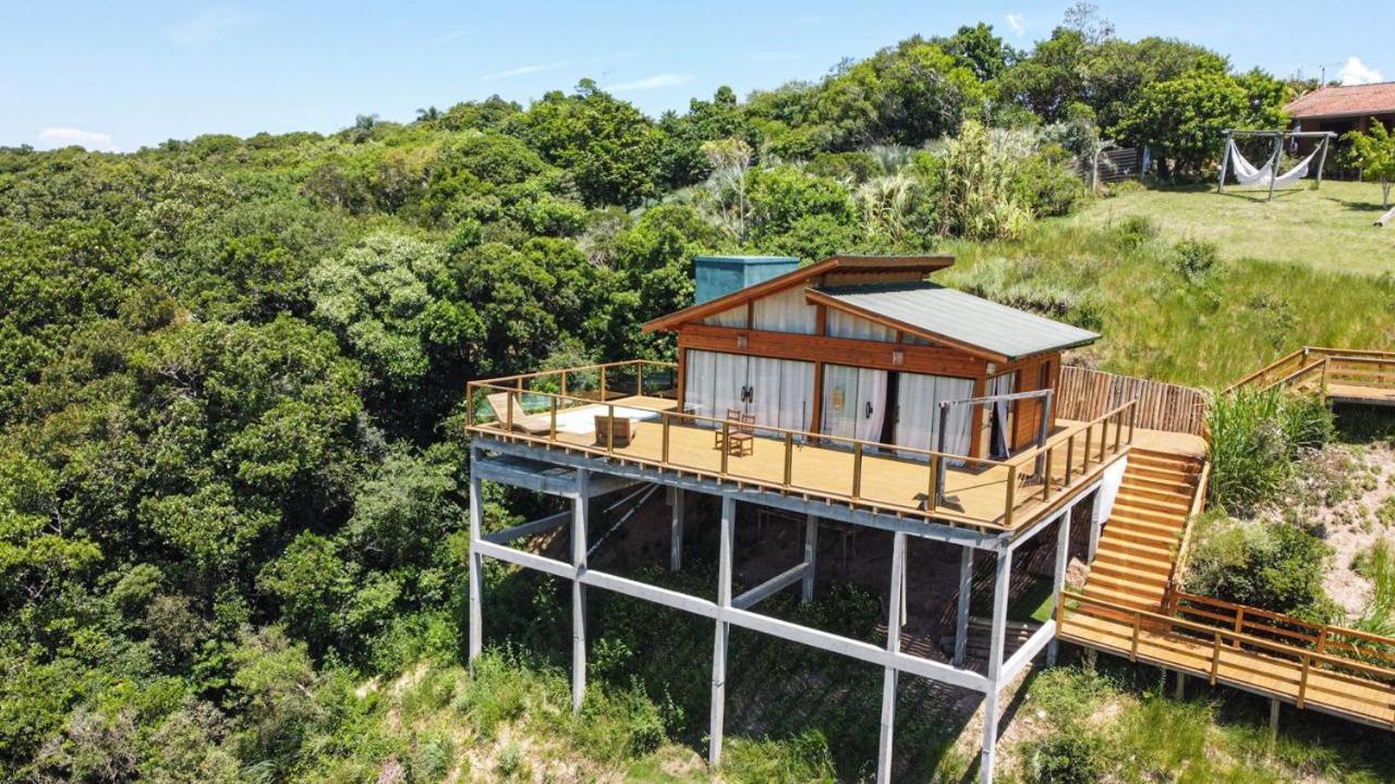 Casa com jacuzzi e piscina aquecida- Praia do Rosa-SC