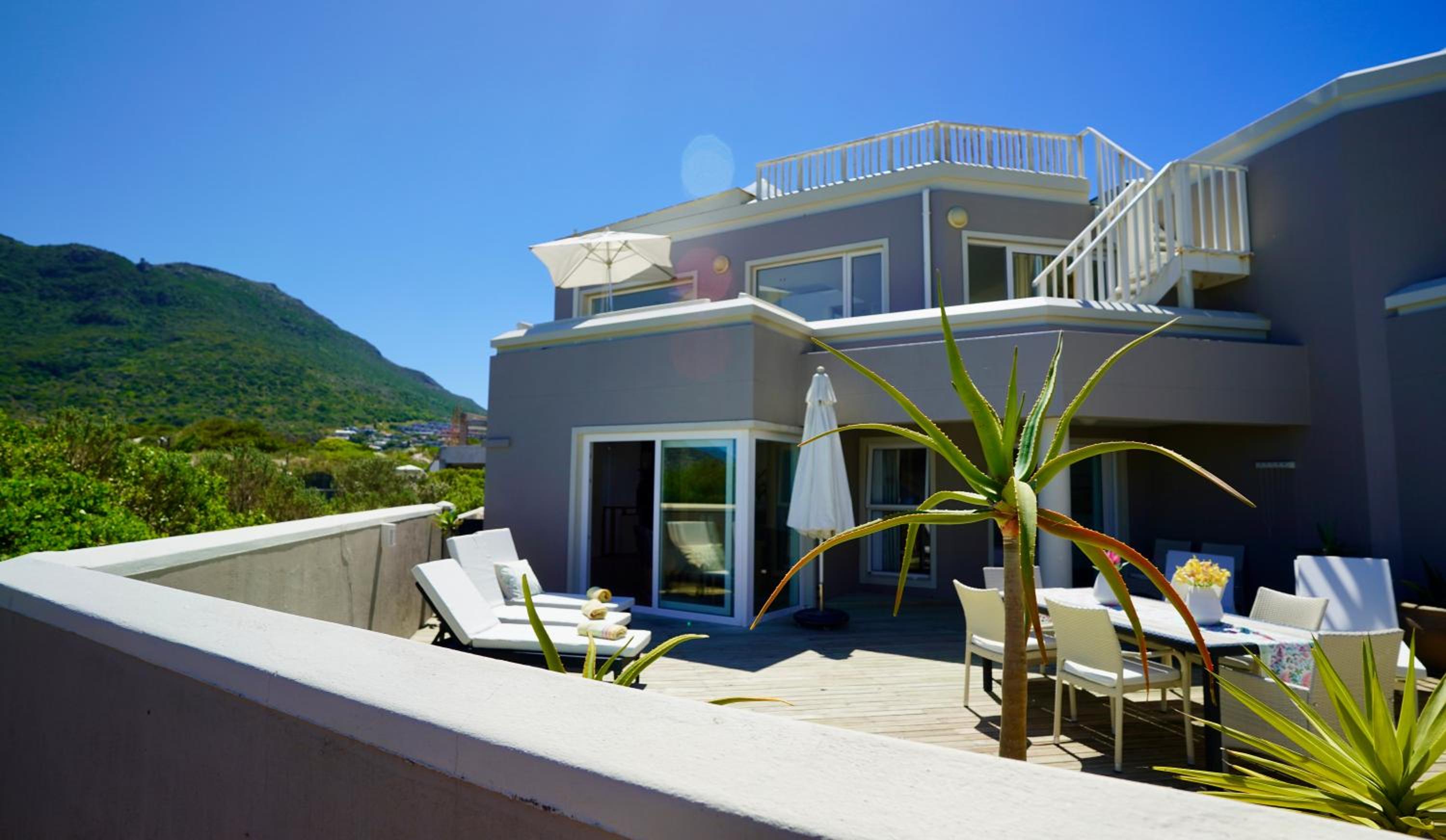 Hotel Beachfront Villa with Jacuzzi by the sea Hout Bay Cape Town - Image 1