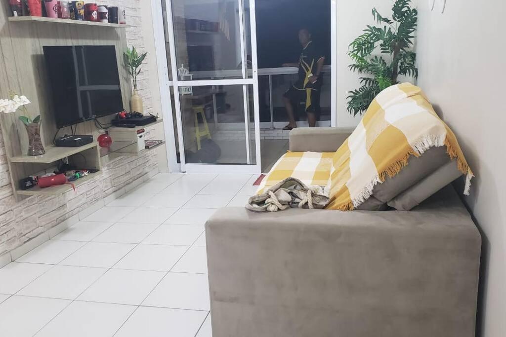 Apartamento encantador pé na areia!