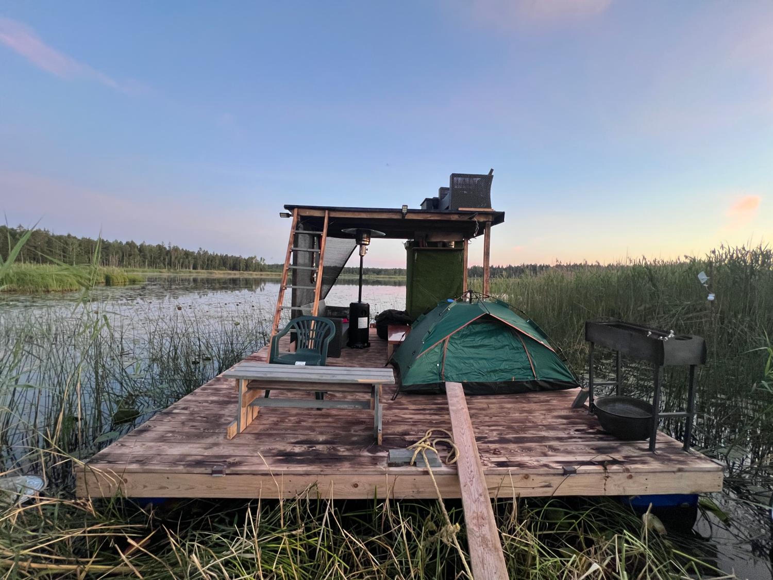 Raft on a forest lake view 5