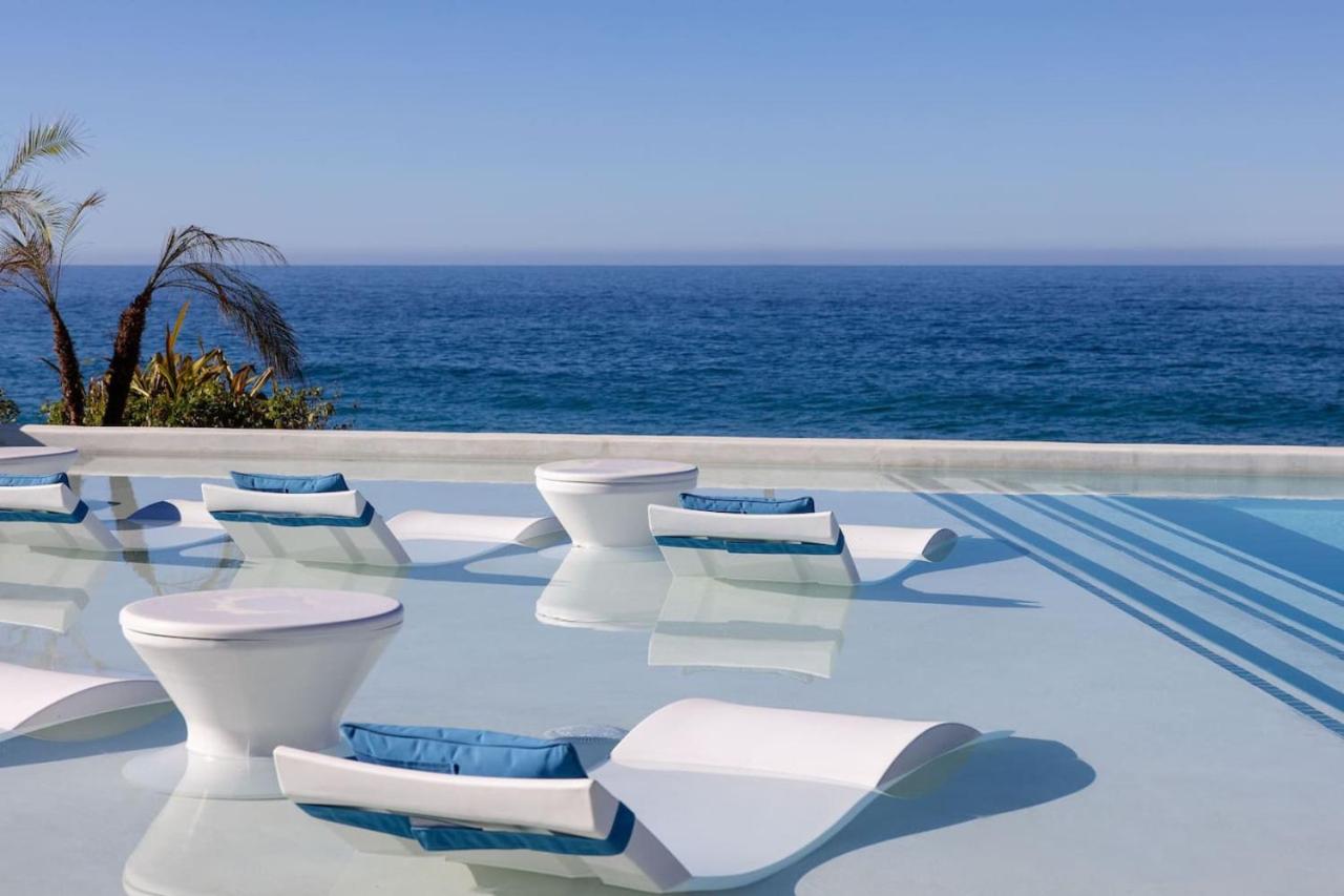 Stunning Beachfront Residence with Resort Perks