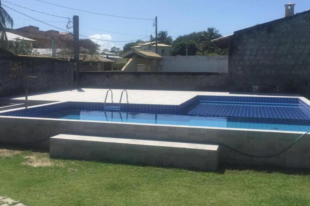 Casa com quatro quartos 3 suítes com ar e piscina particular