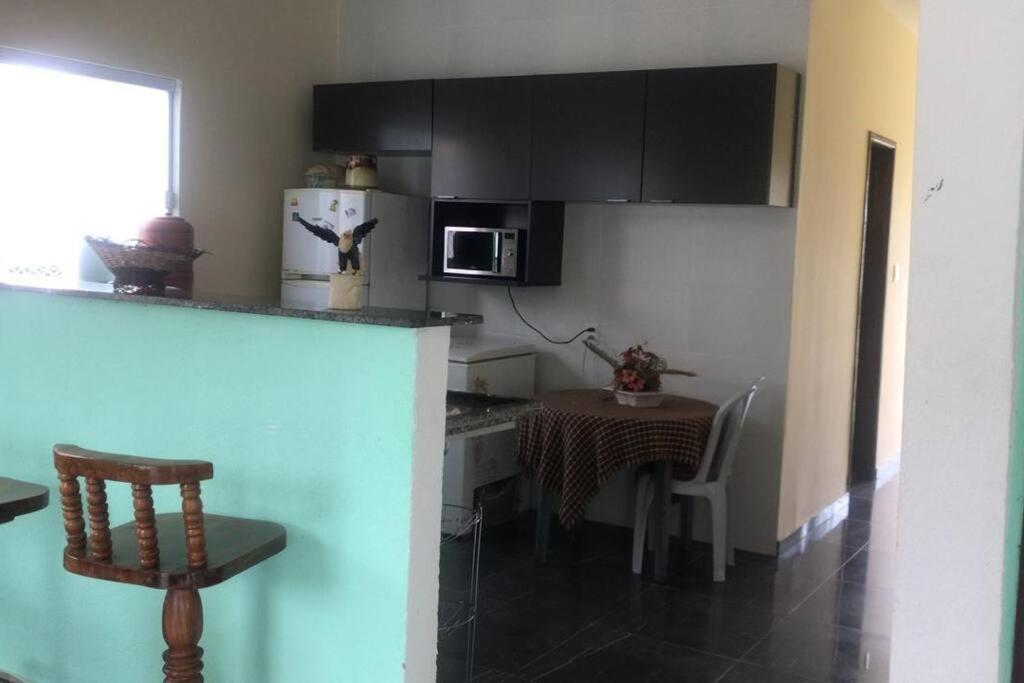Casa com quatro quartos 3 suítes com ar e piscina particular