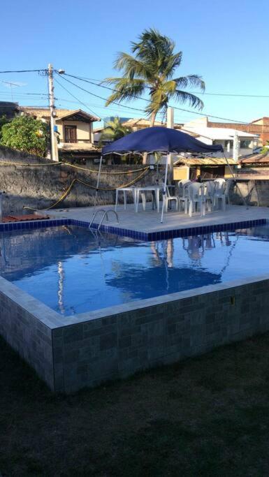 Casa com quatro quartos 3 suítes com ar e piscina particular