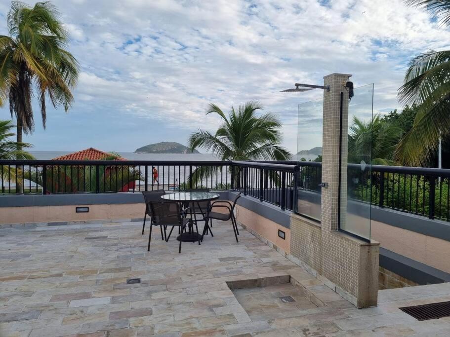 Casa Cond Ocean House Camboinhas Pé na Areia 4qts