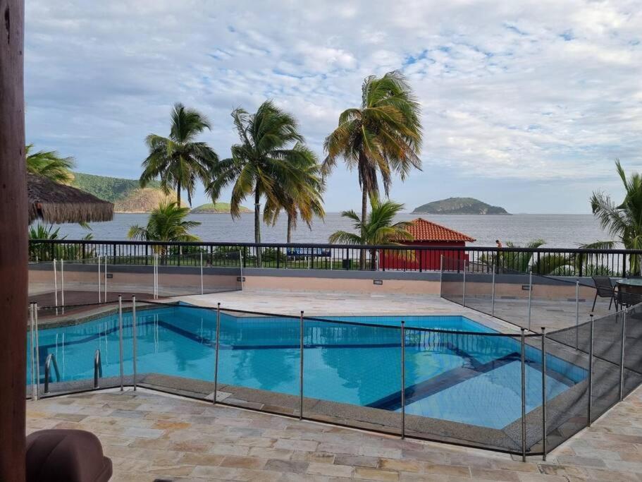Casa Cond Ocean House Camboinhas Pé na Areia 4qts