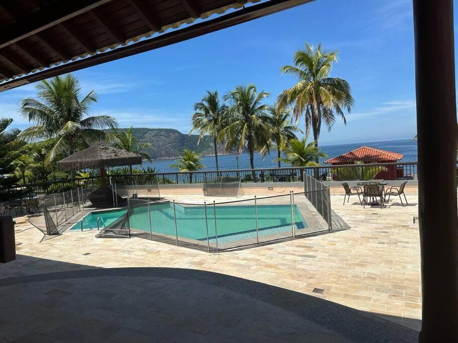 Casa Cond Ocean House Camboinhas Pé na Areia 4qts