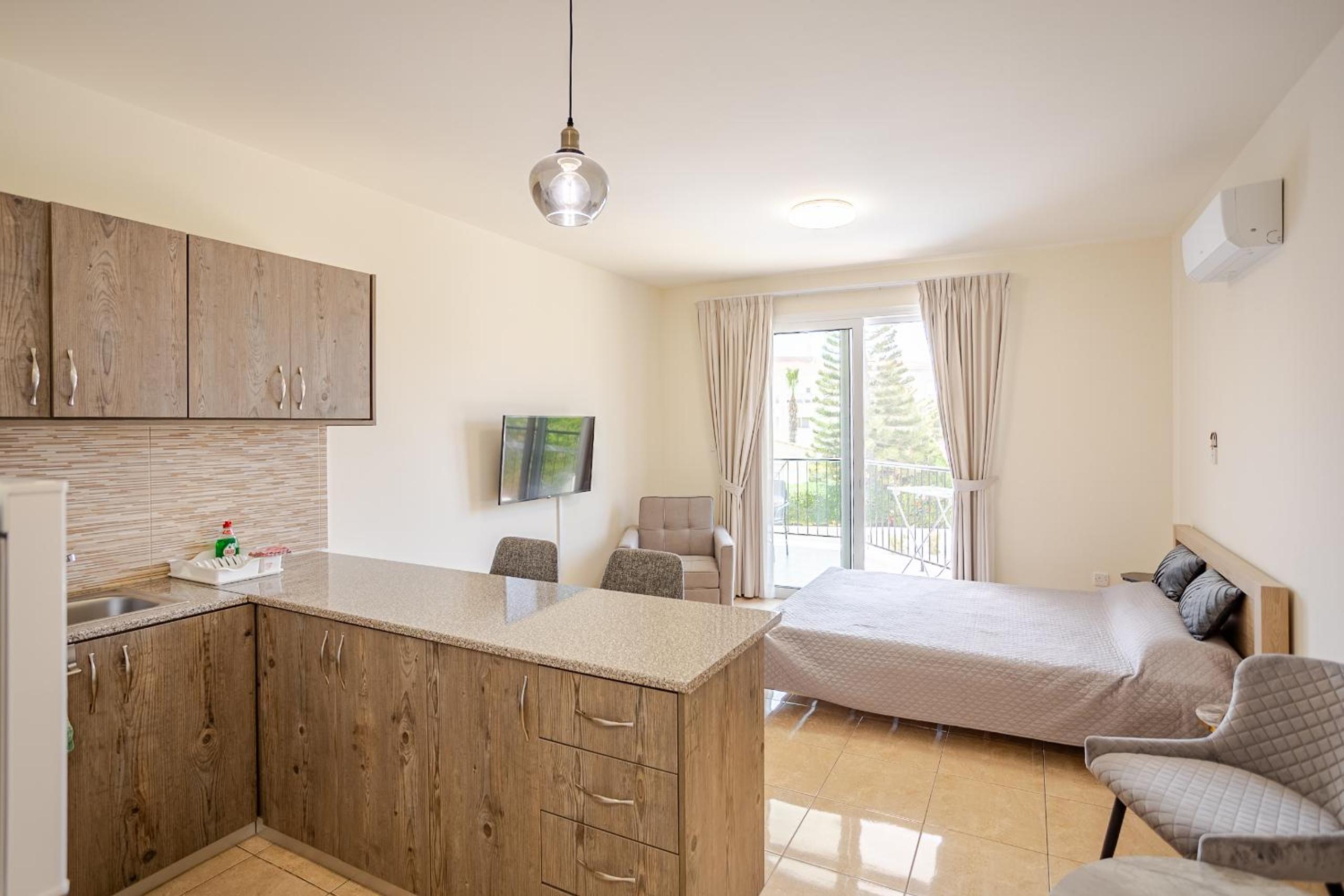Danaos Seaside Suite 104 with Pool in Tourist Area