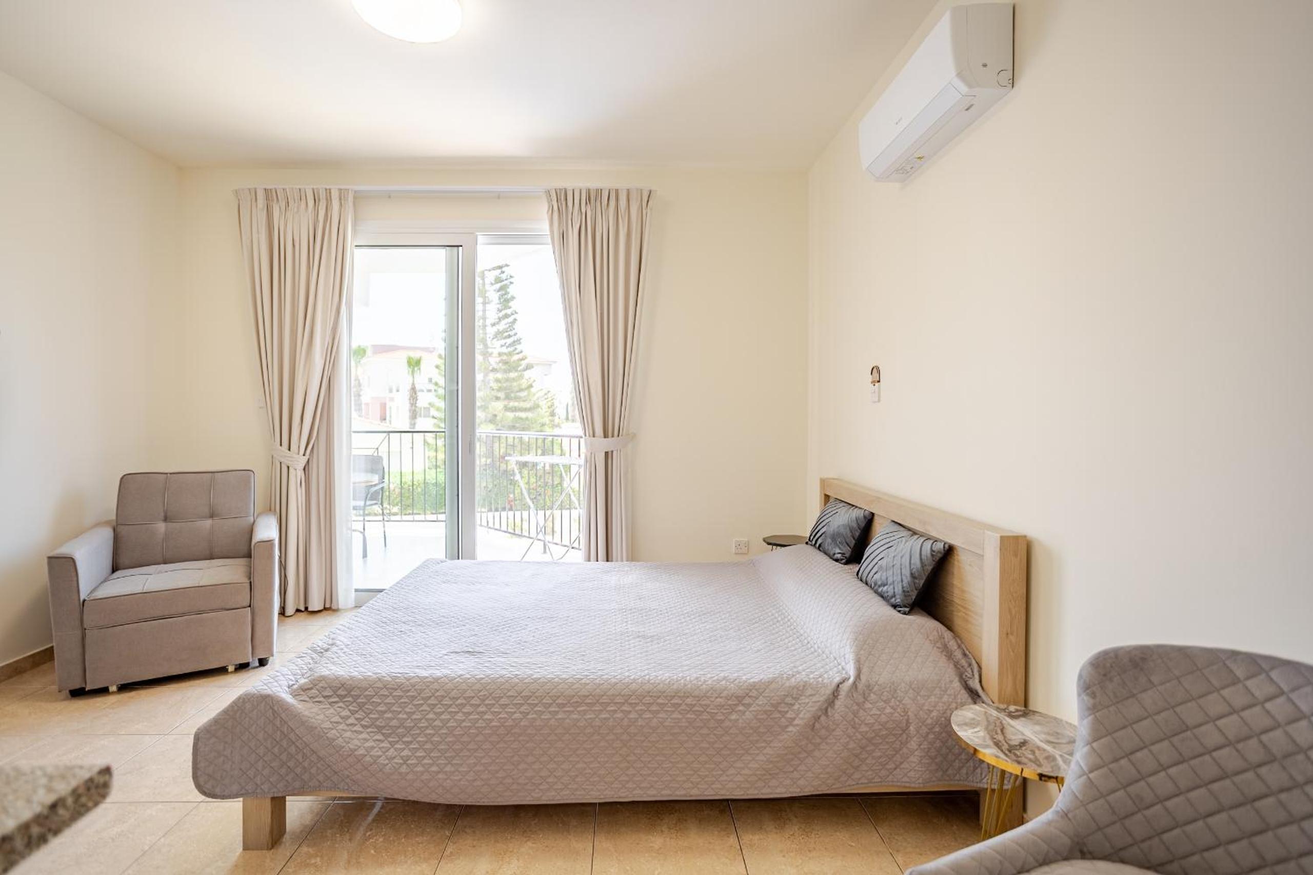 Danaos Seaside Suite 104 with Pool in Tourist Area
