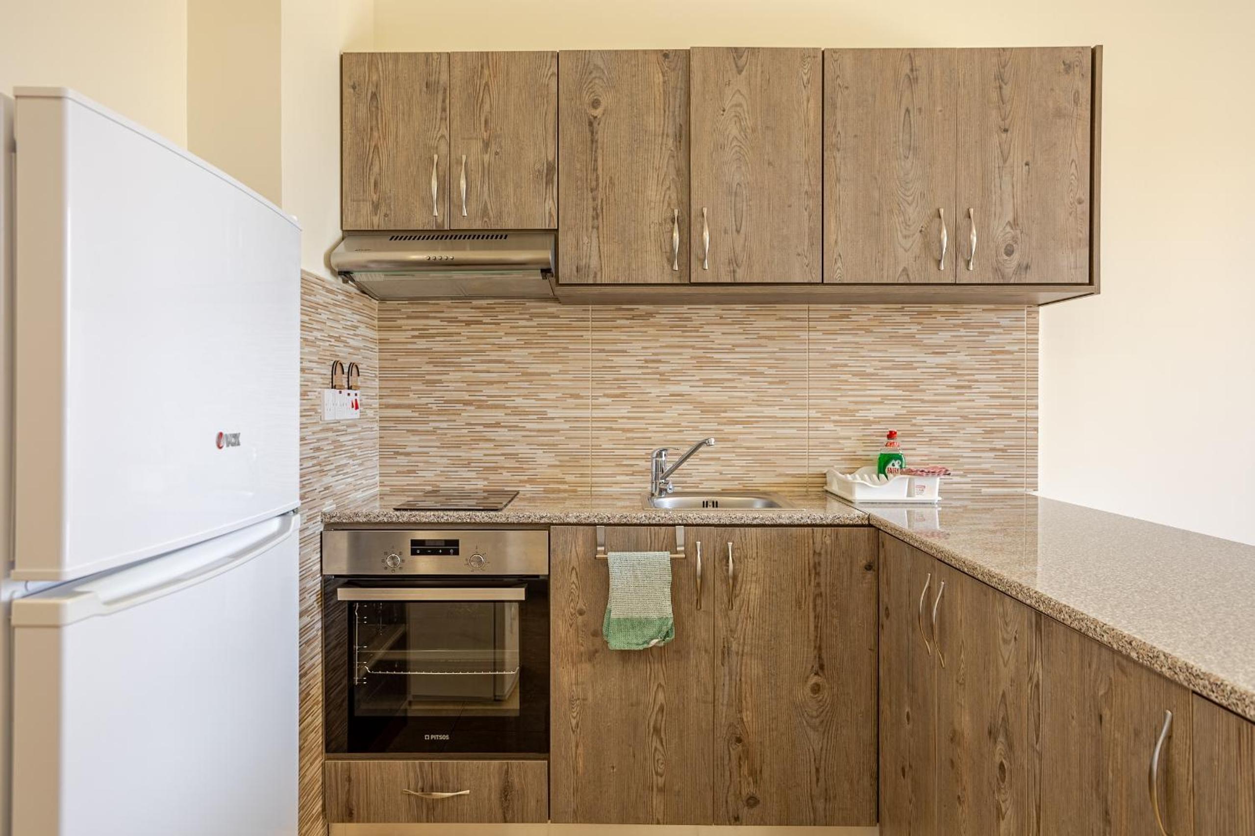 Danaos Seaside Suite 104 with Pool in Tourist Area