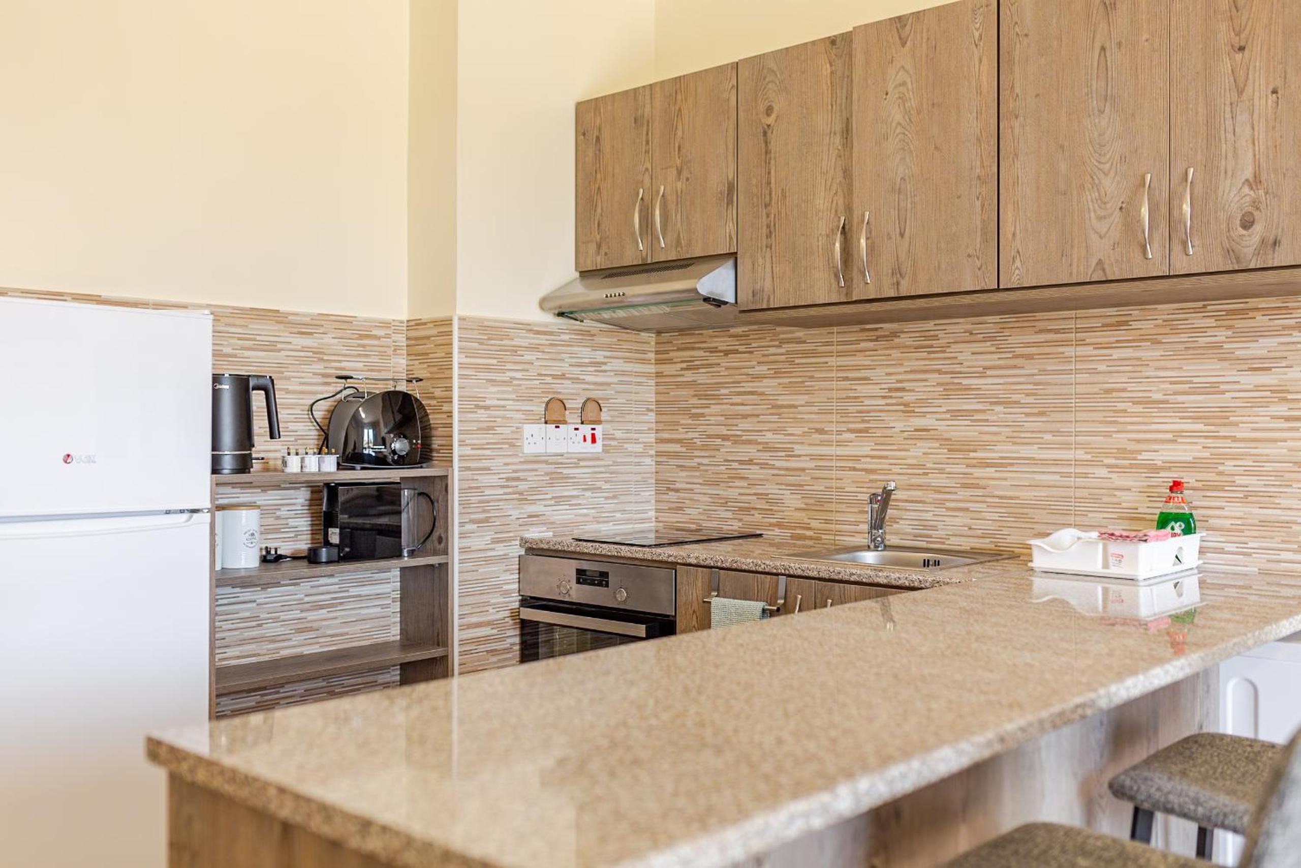 Danaos Seaside Suite 104 with Pool in Tourist Area