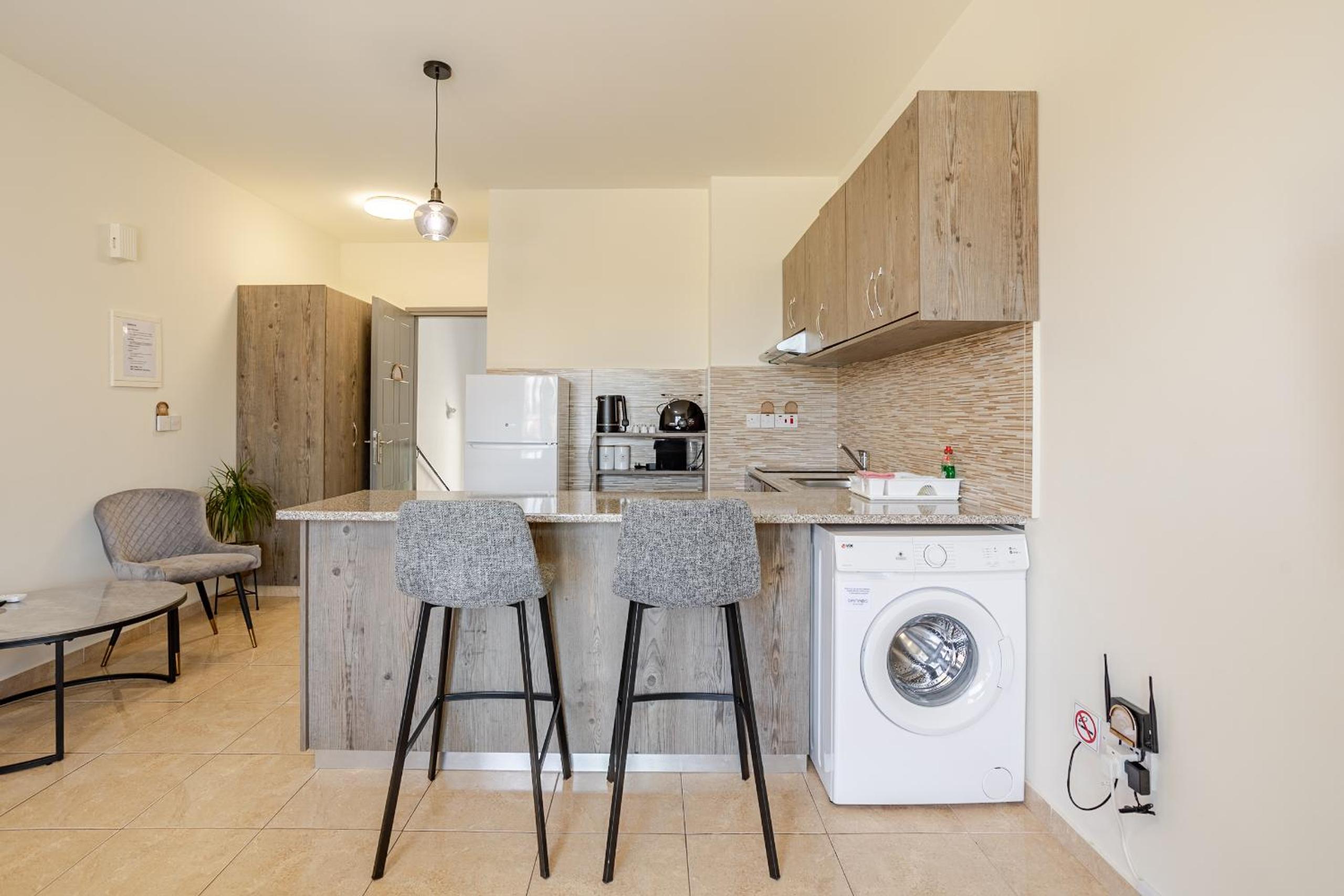 Danaos Seaside Suite 104 with Pool in Tourist Area