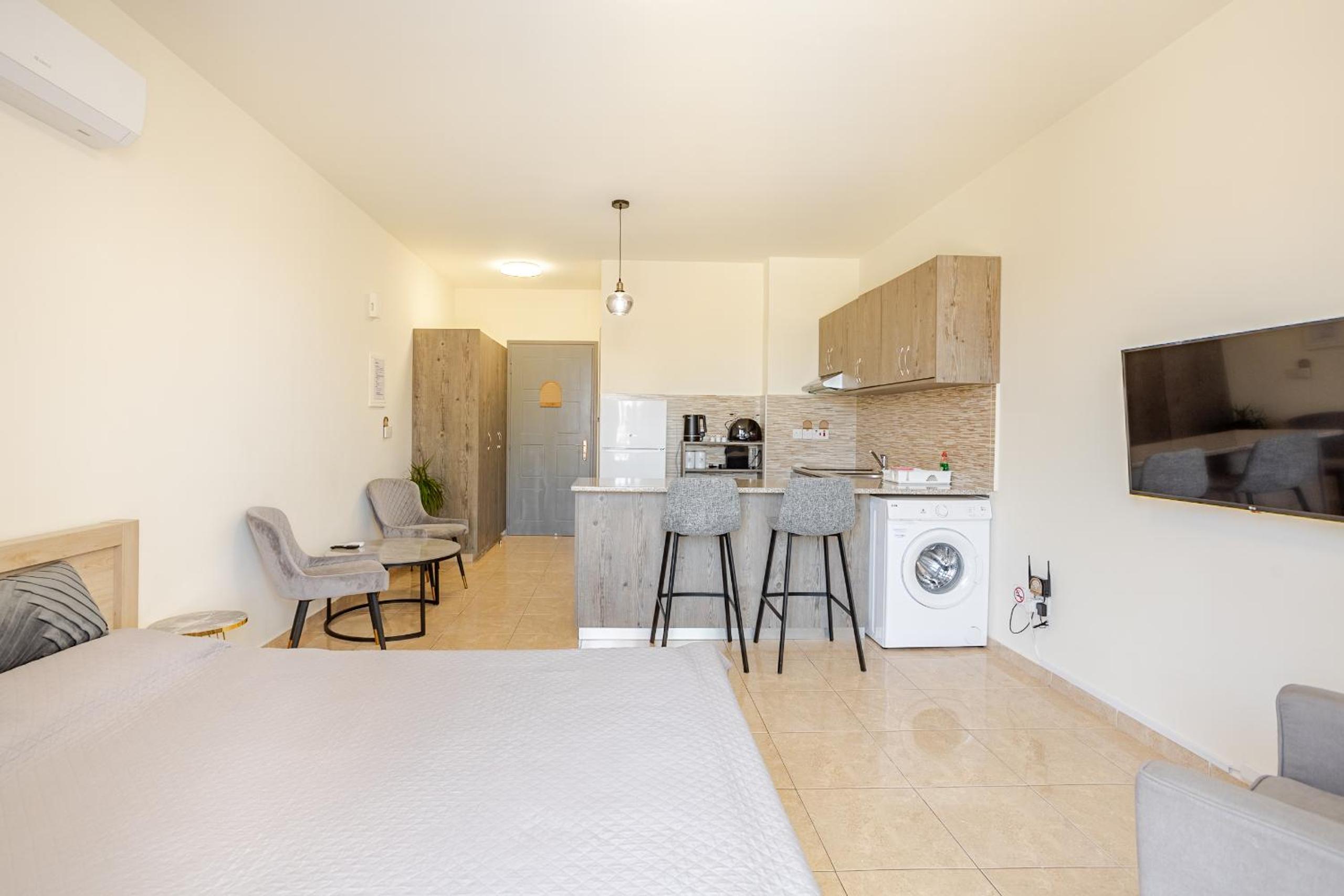 Danaos Seaside Suite 104 with Pool in Tourist Area