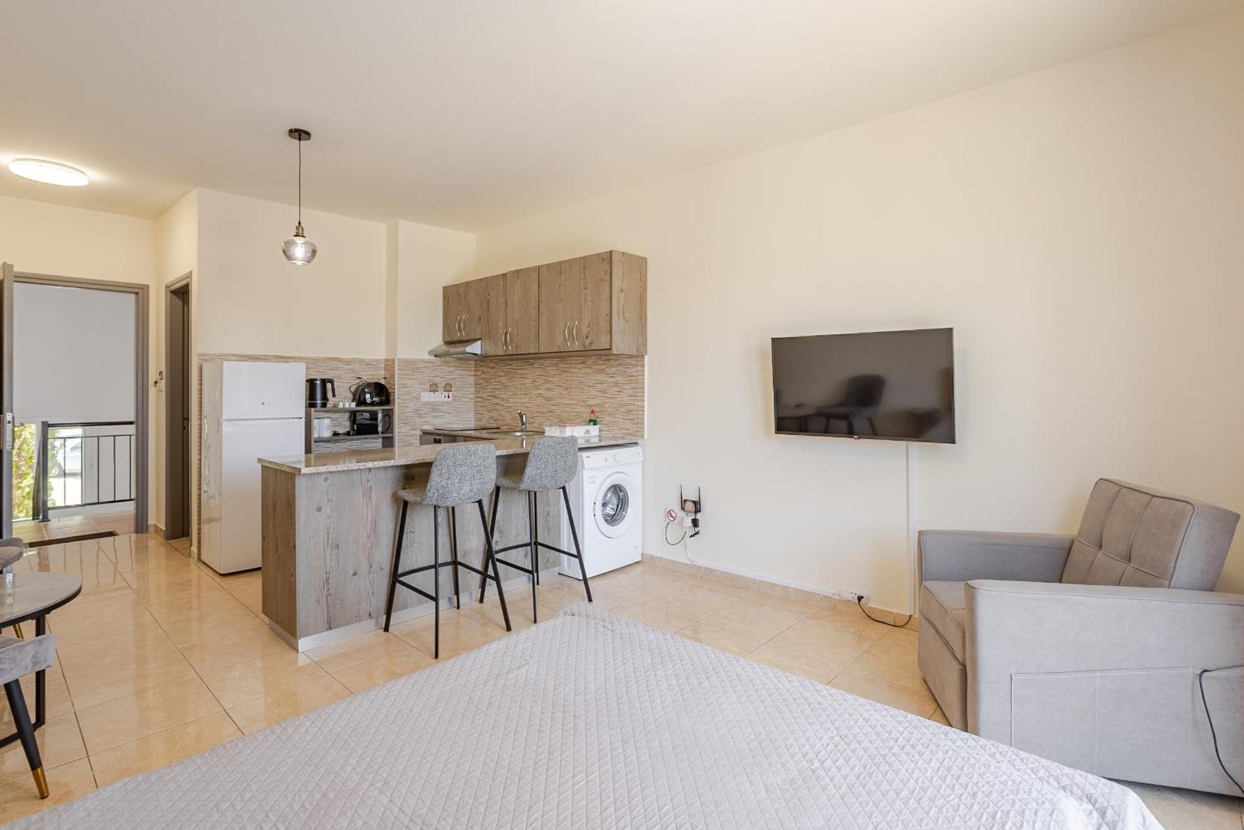 Danaos Seaside Suite 104 with Pool in Tourist Area
