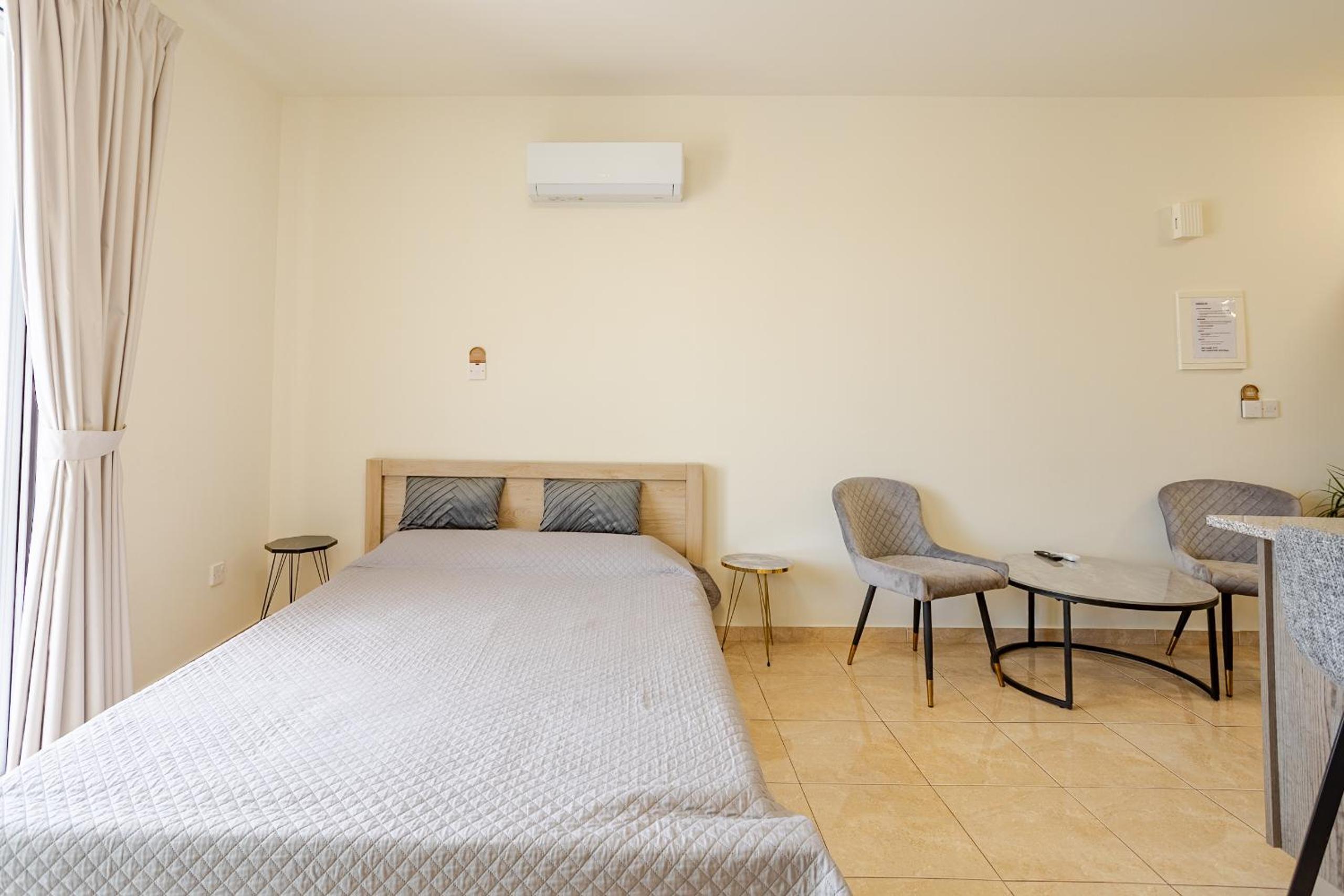 Danaos Seaside Suite 104 with Pool in Tourist Area