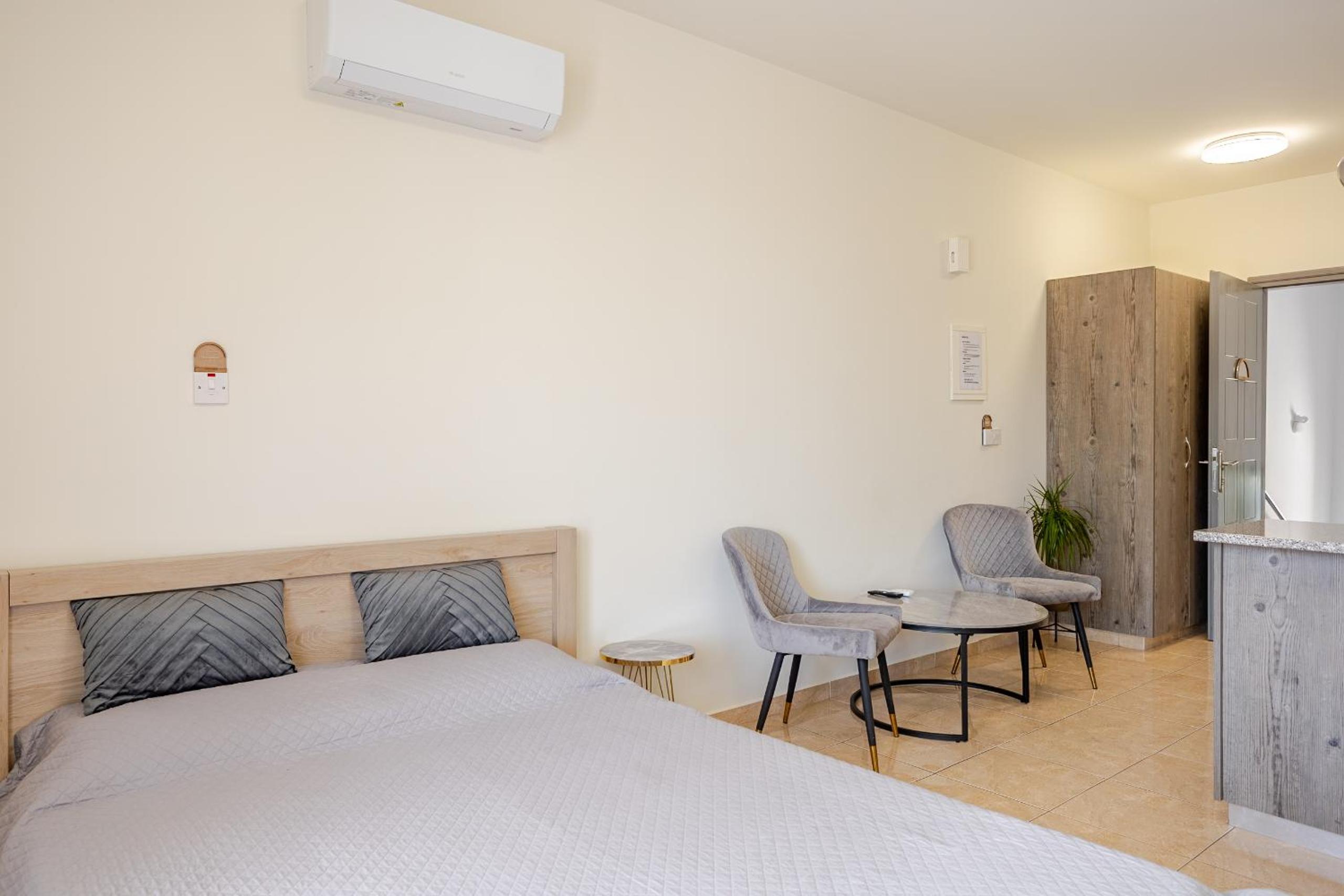 Danaos Seaside Suite 104 with Pool in Tourist Area