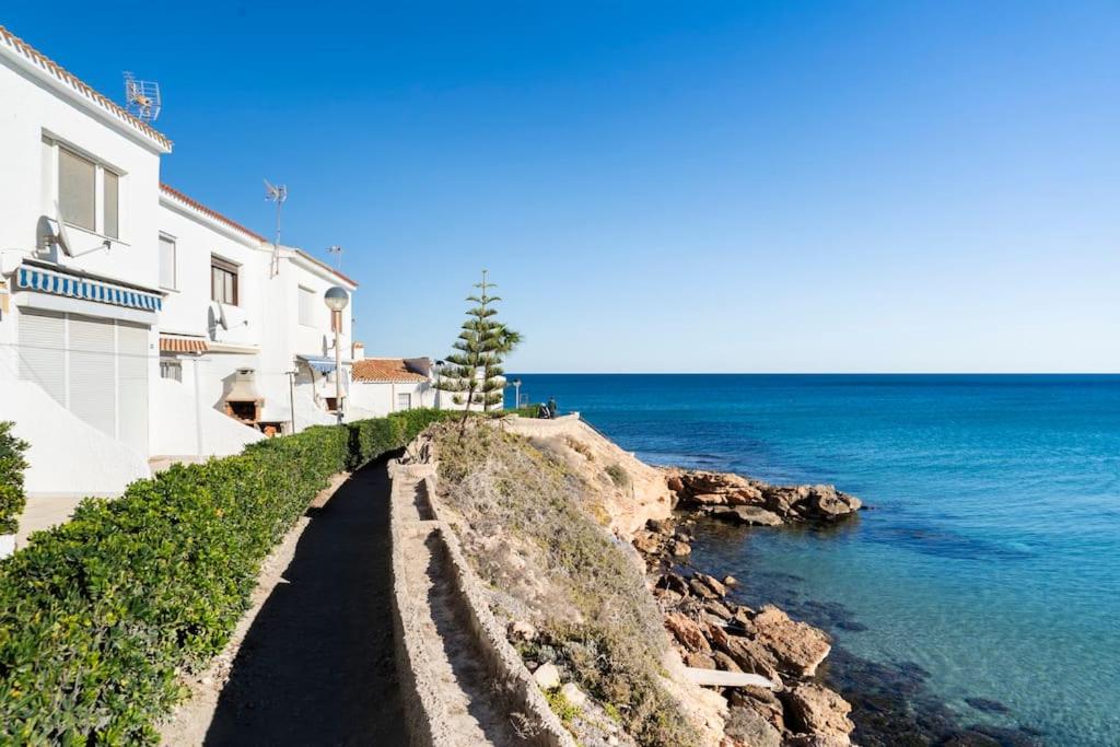 Seaview Bliss - Playa Flamenca Beachfront Bungalow