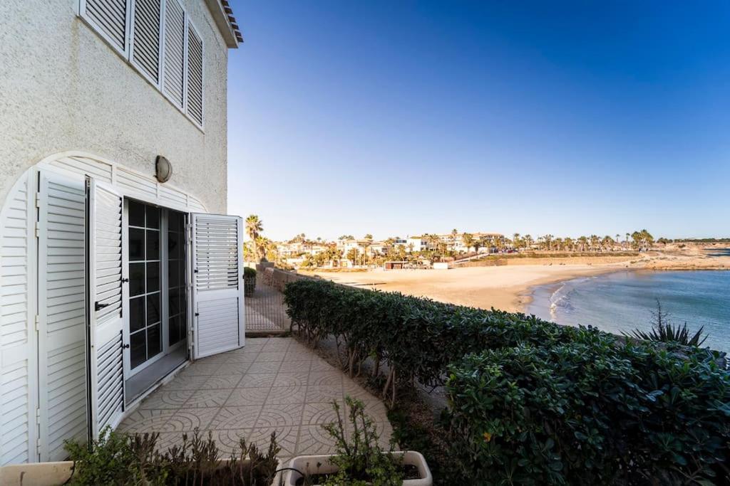 Seaview Bliss - Playa Flamenca Beachfront Bungalow