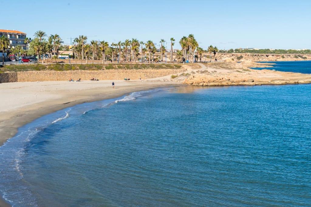 Seaview Bliss - Playa Flamenca Beachfront Bungalow