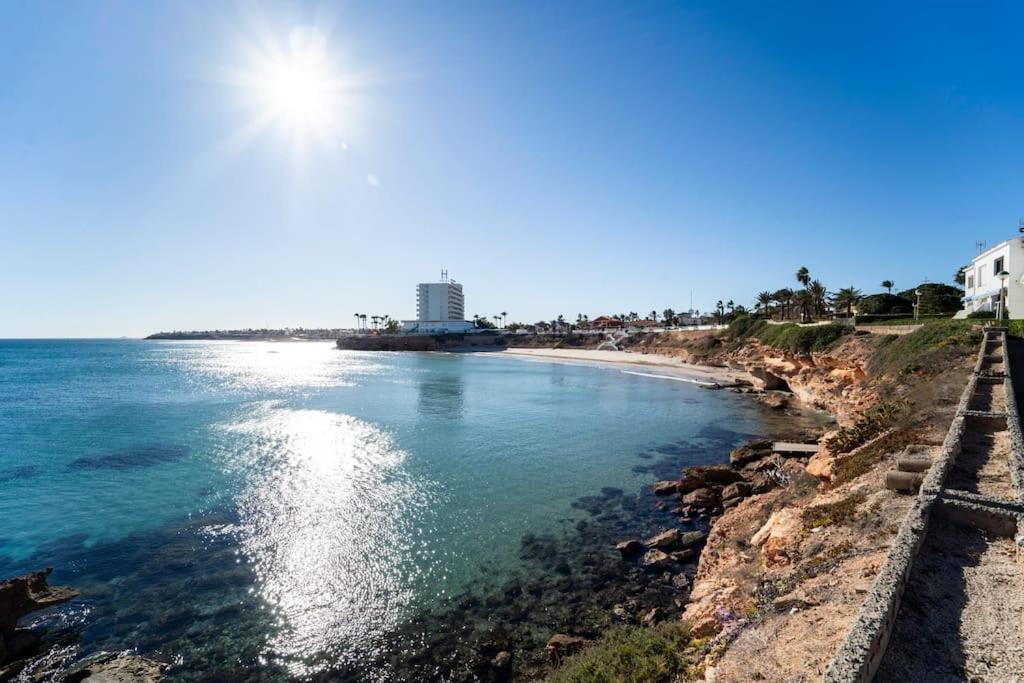 Seaview Bliss - Playa Flamenca Beachfront Bungalow