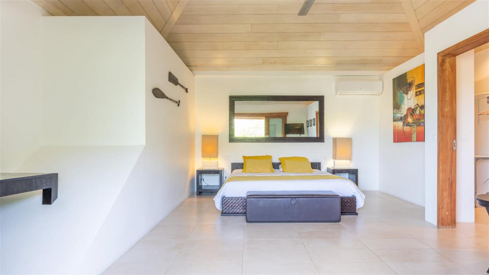 Asian inspired villa in a lush vegetation