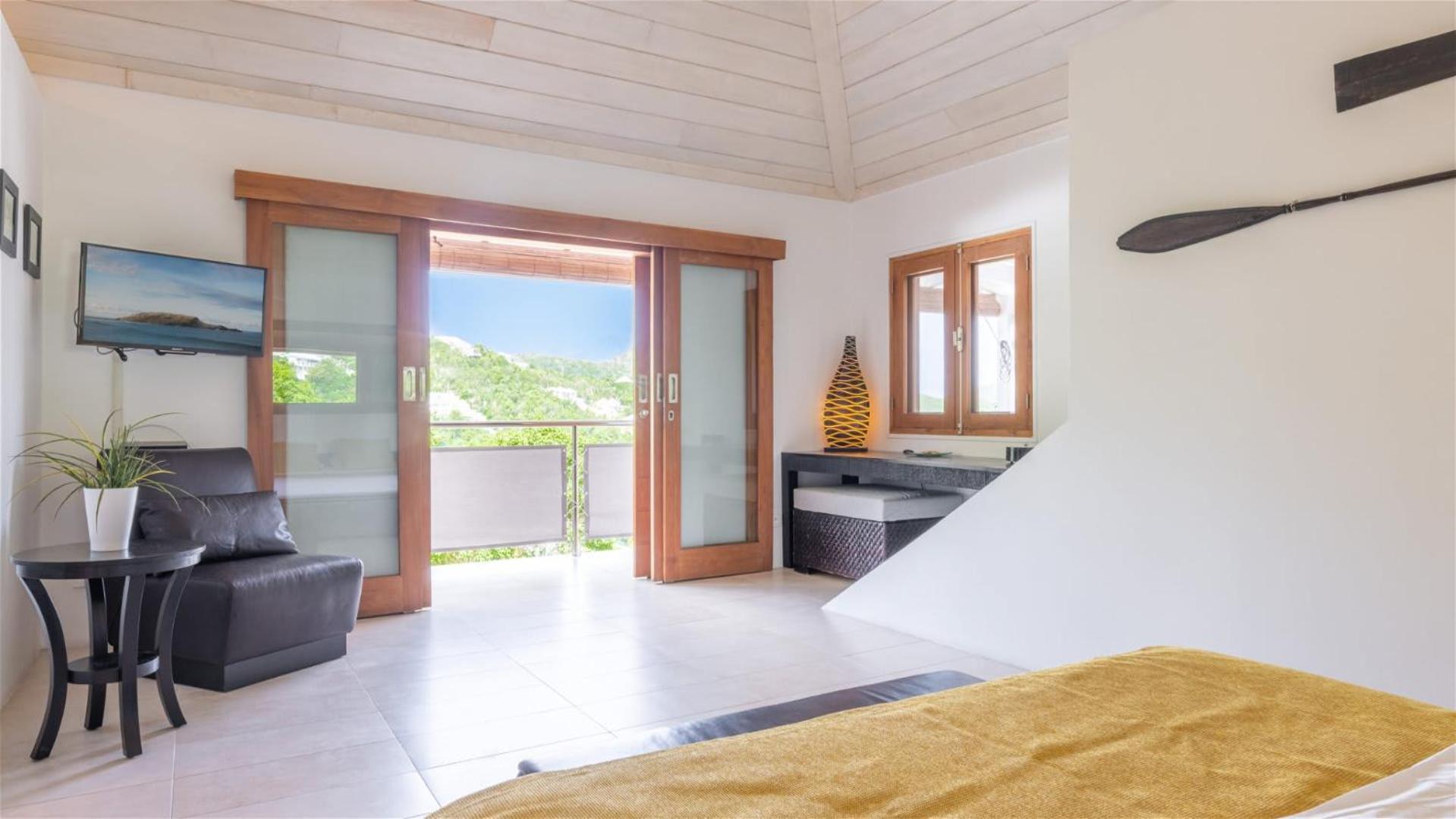 Asian inspired villa in a lush vegetation
