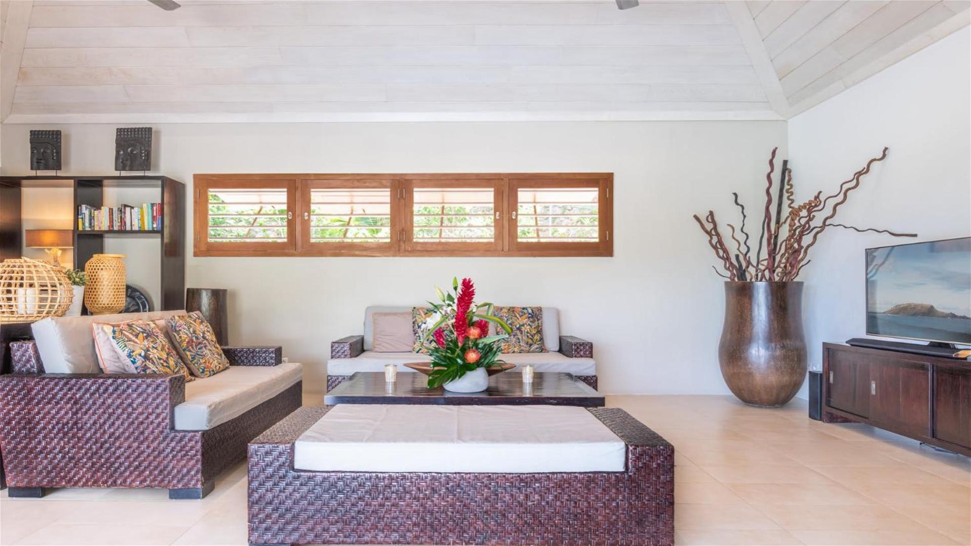 Asian inspired villa in a lush vegetation