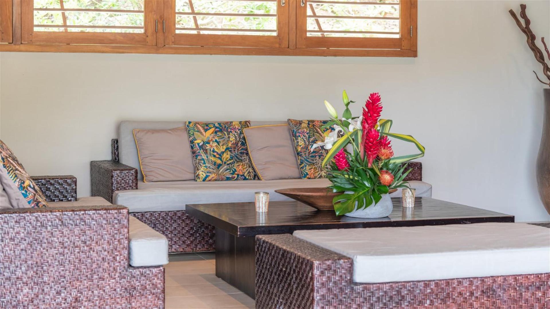 Asian inspired villa in a lush vegetation