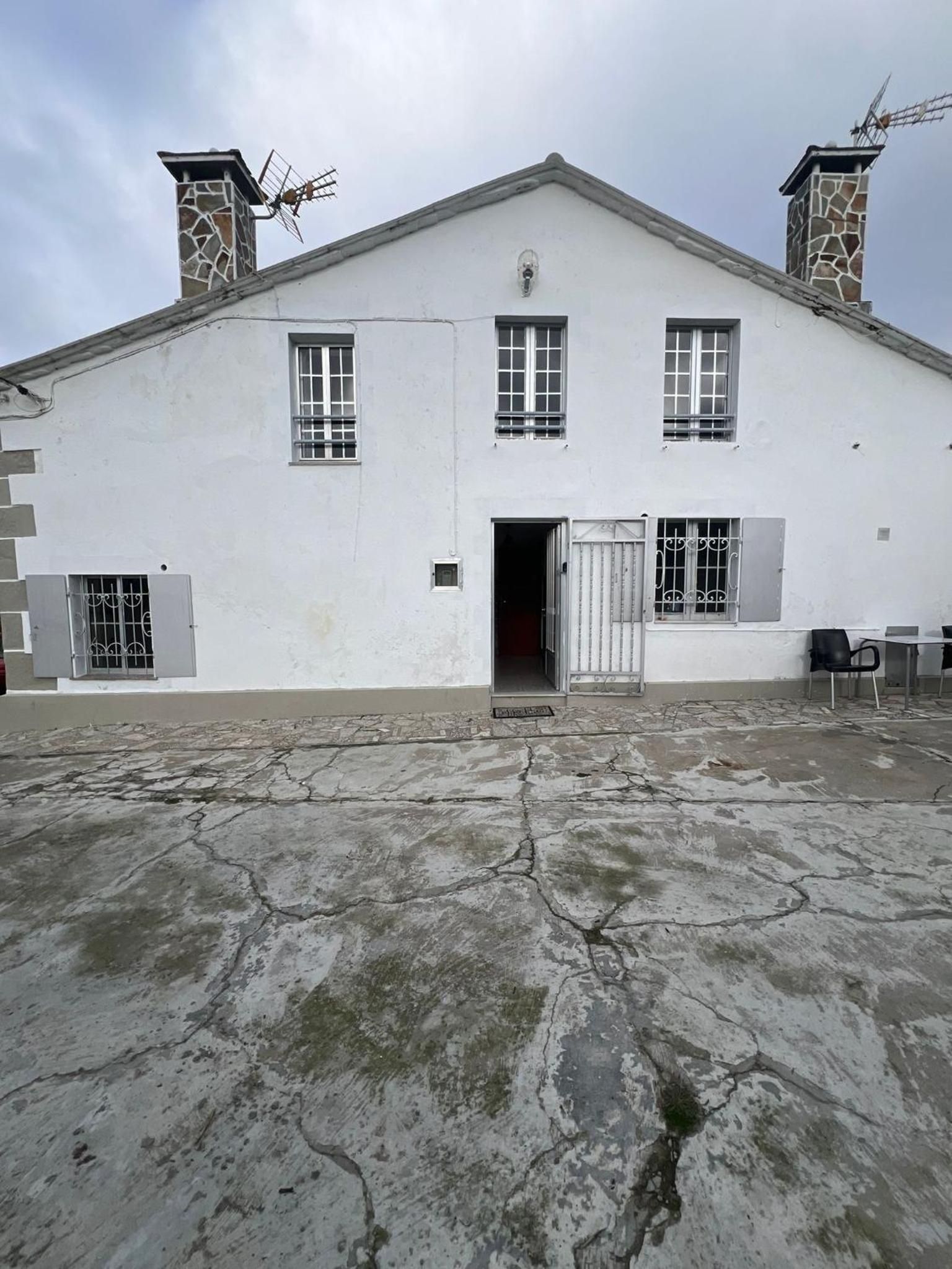 Casa de campo adosada