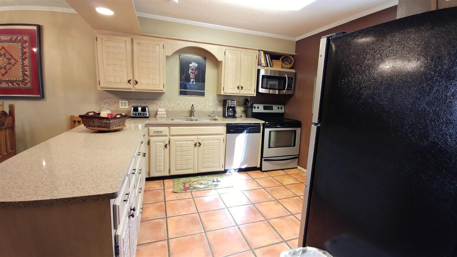 Claim Jumper Townhouse 22 - On The River - Across from the Fishing Ponds - In Town - Near The Ski Area - Fireplace - WiFi - Sate view 3