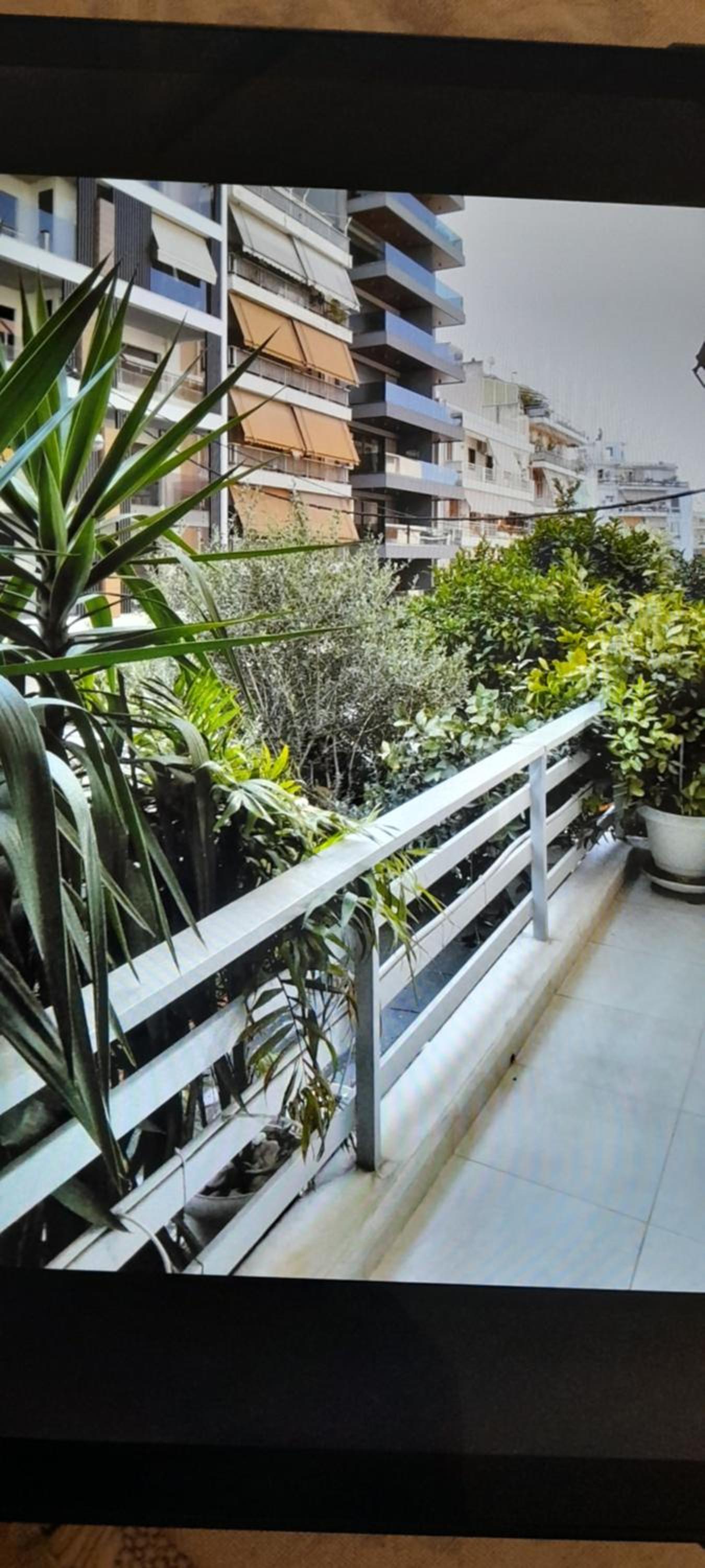 Apartment with a green balcony in Athens