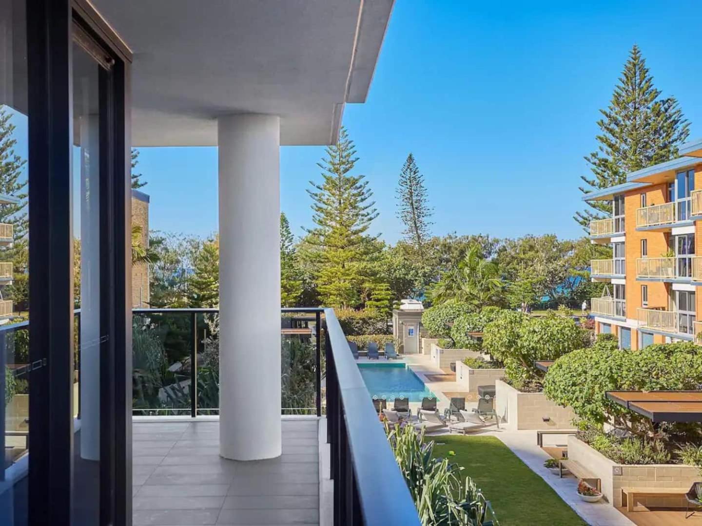 Beach front luxury with two carparks, pool, gym