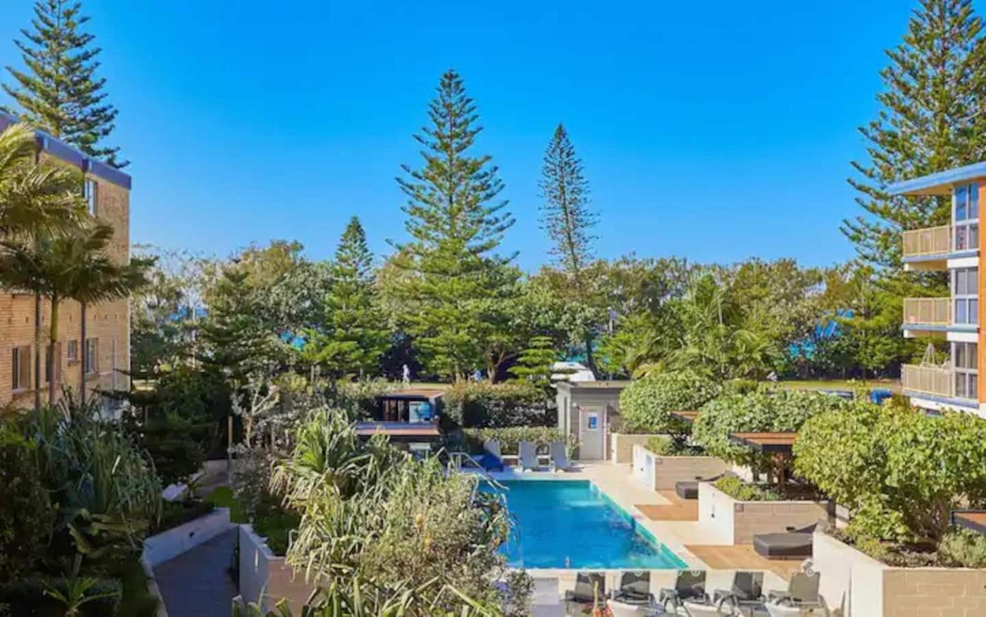 Beach front luxury with two carparks, pool, gym