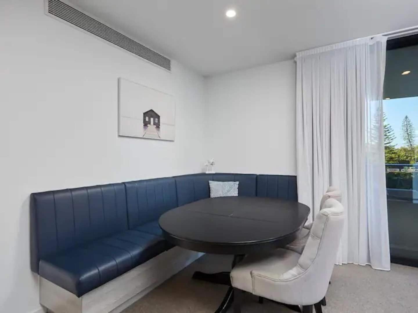 Beach front luxury with two carparks, pool, gym