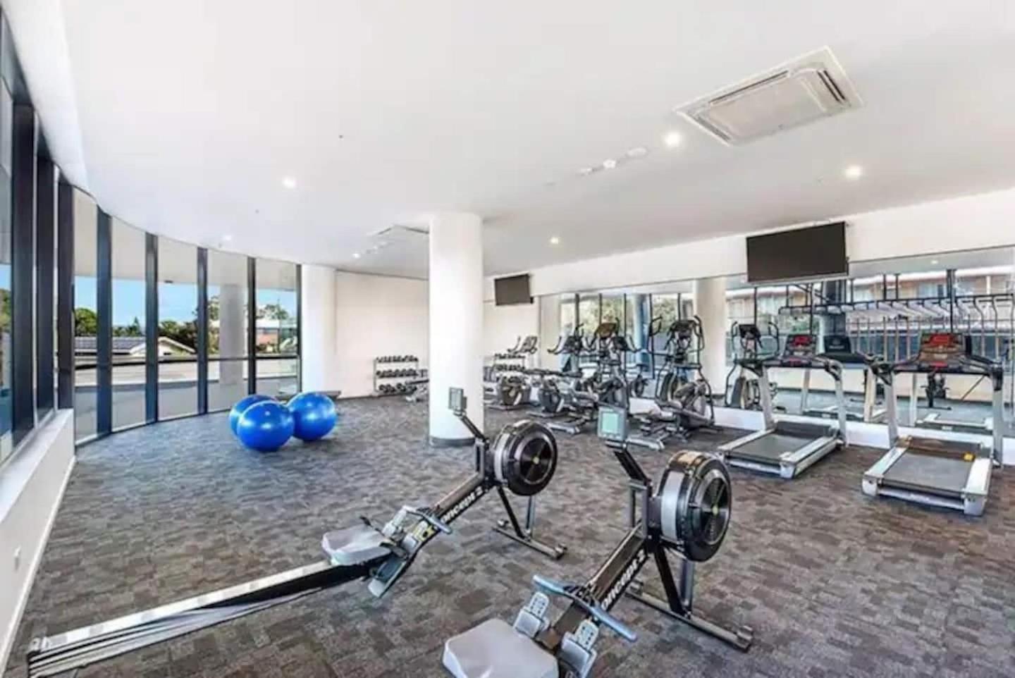 Beach front luxury with two carparks, pool, gym