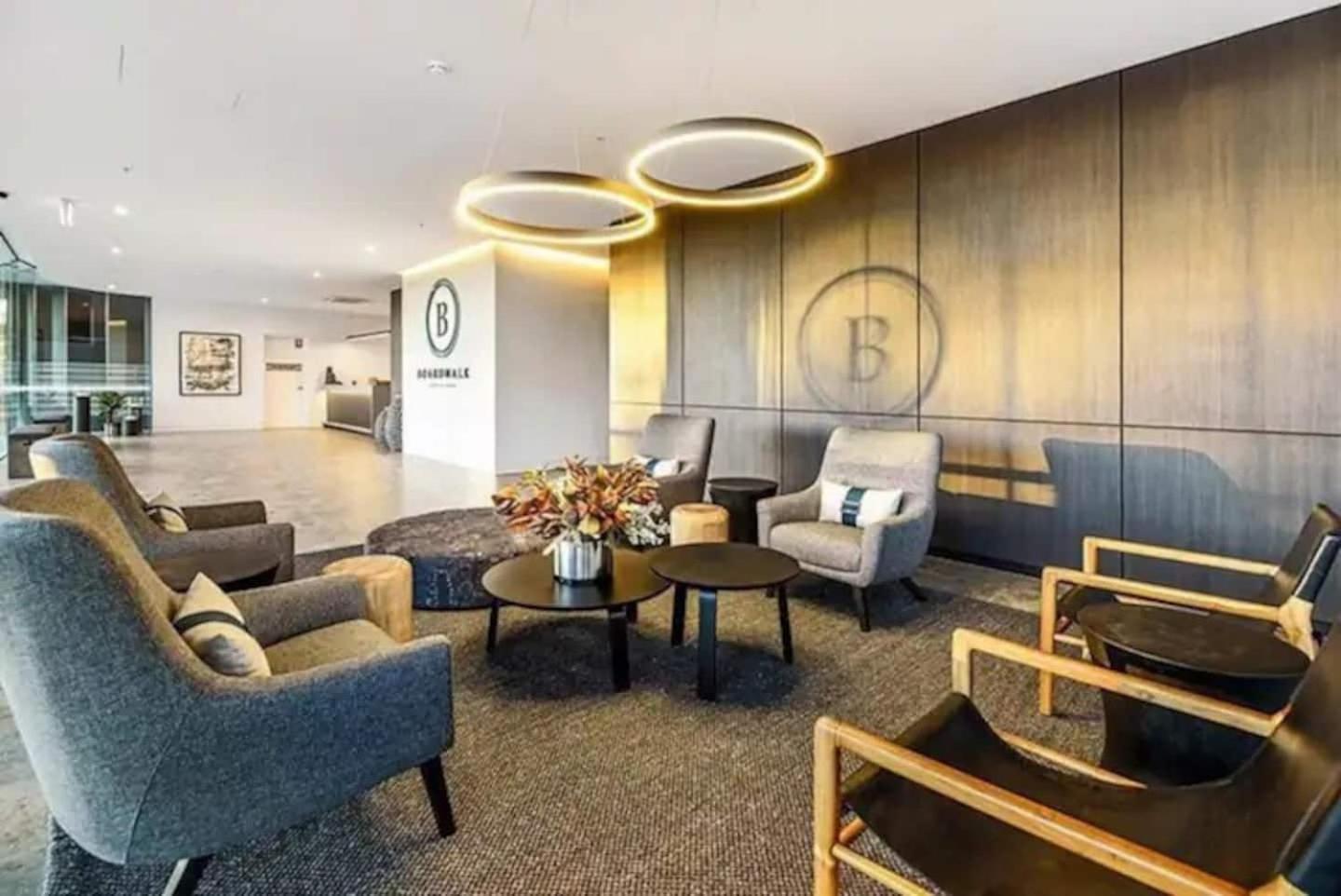 Beach front luxury with two carparks, pool, gym