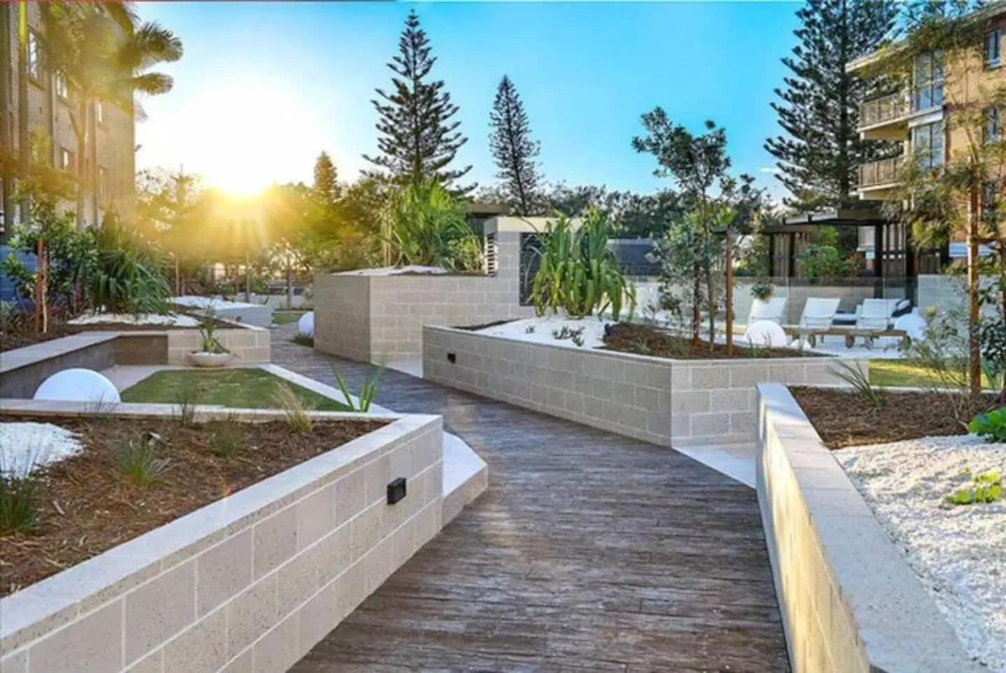 Beach front luxury with two carparks, pool, gym