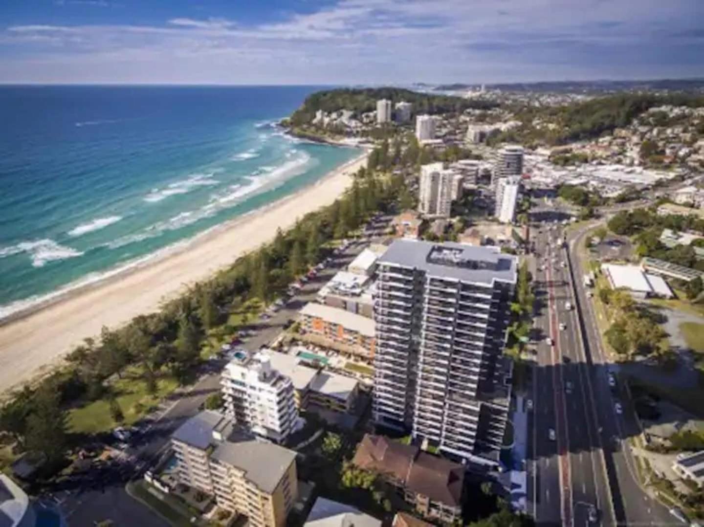 Beach front luxury with two carparks, pool, gym