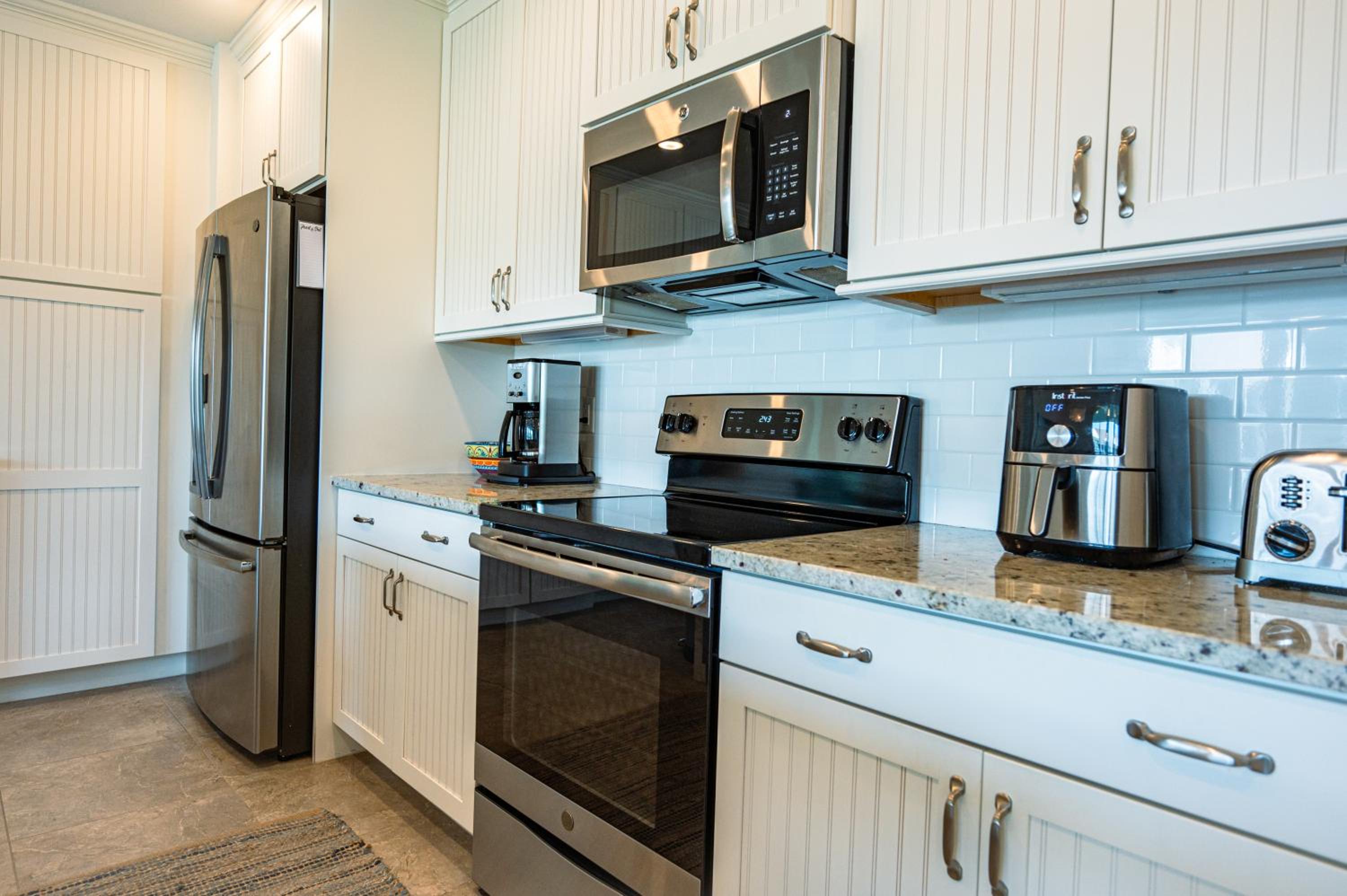 Island Time Harbour Isle! Modern, Beachy Condo overlooking AMI Sound! view 3