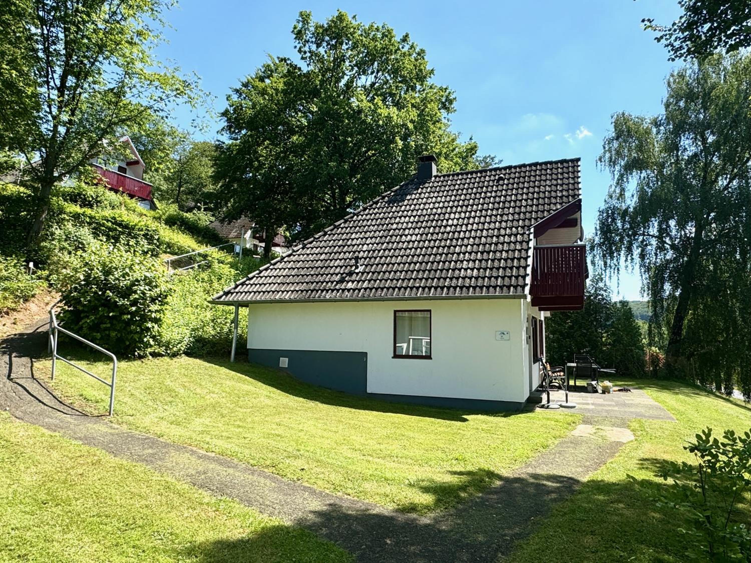 Ferienhaus 21 mit Seeblick und Garten bis 6 Personen