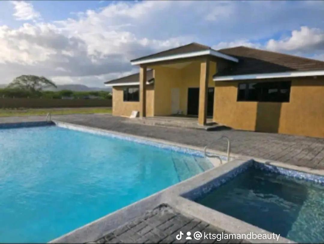 Barefoot Bliss Short Term Rental with pool in Colbeck Manor view 3