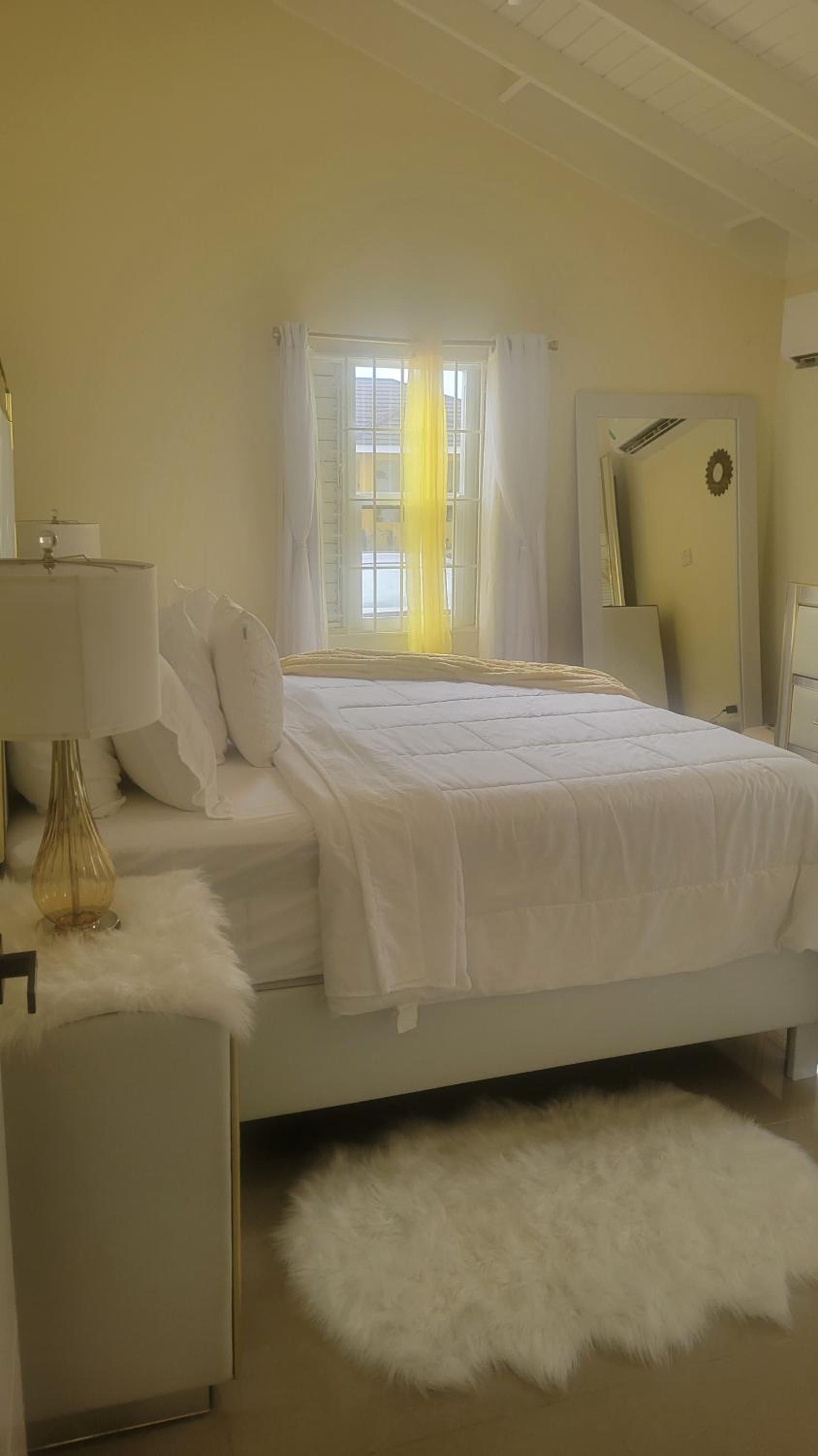 Barefoot Bliss Short Term Rental with pool in Colbeck Manor view 2