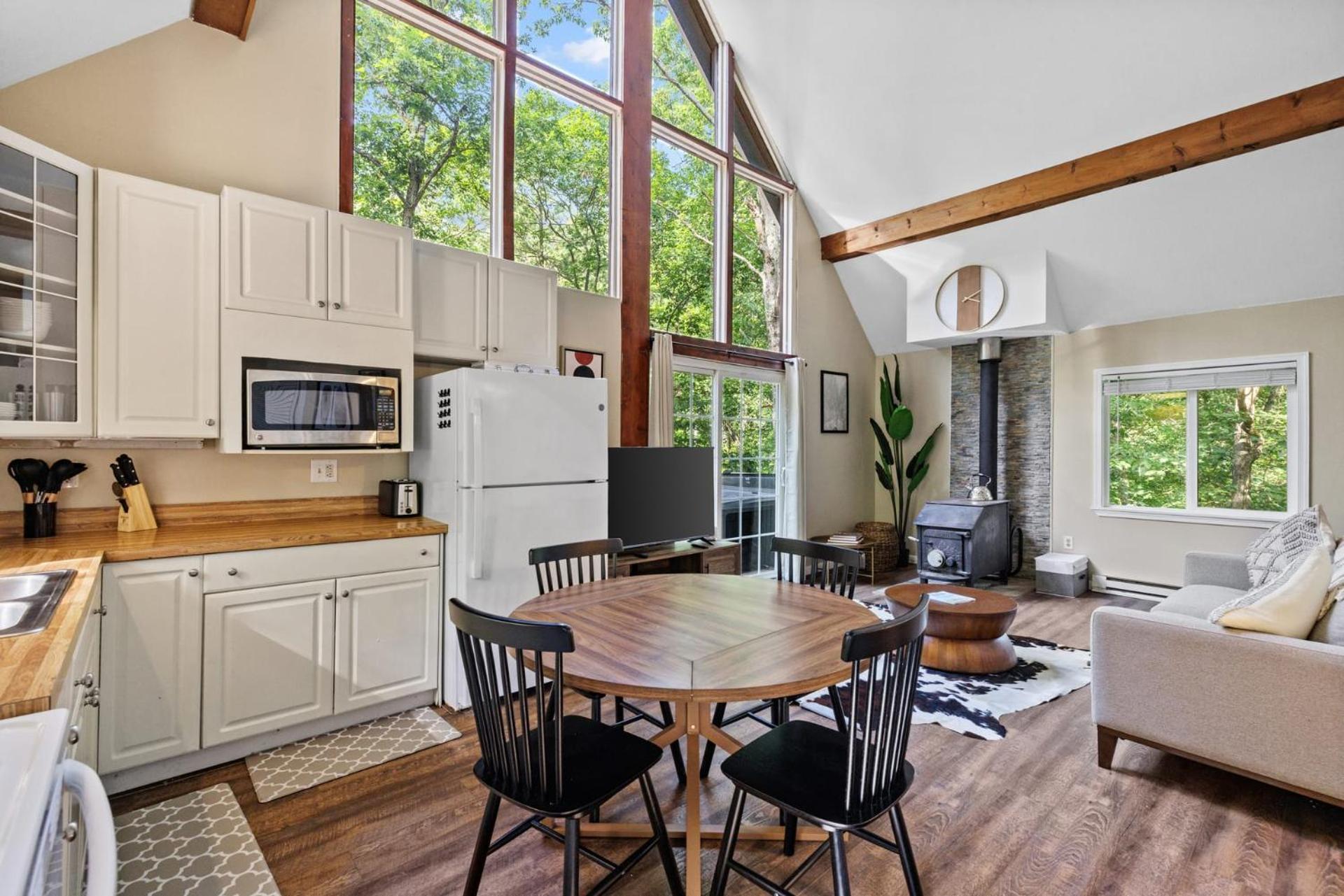 Loft style chalet w hot tub & fireplace view 4