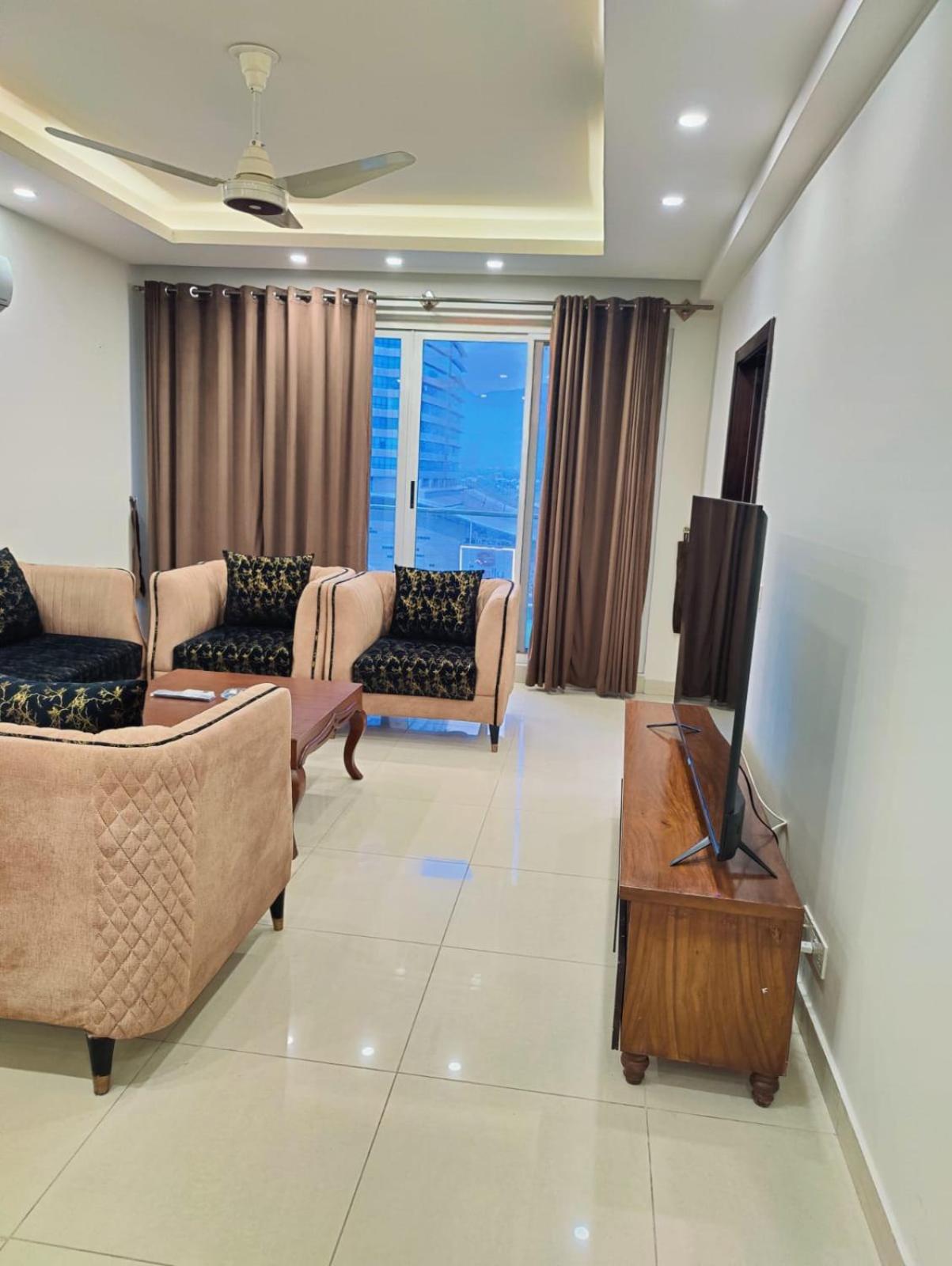 Comfort Inn 2BHK Centaurus facing Family Apartments view 2